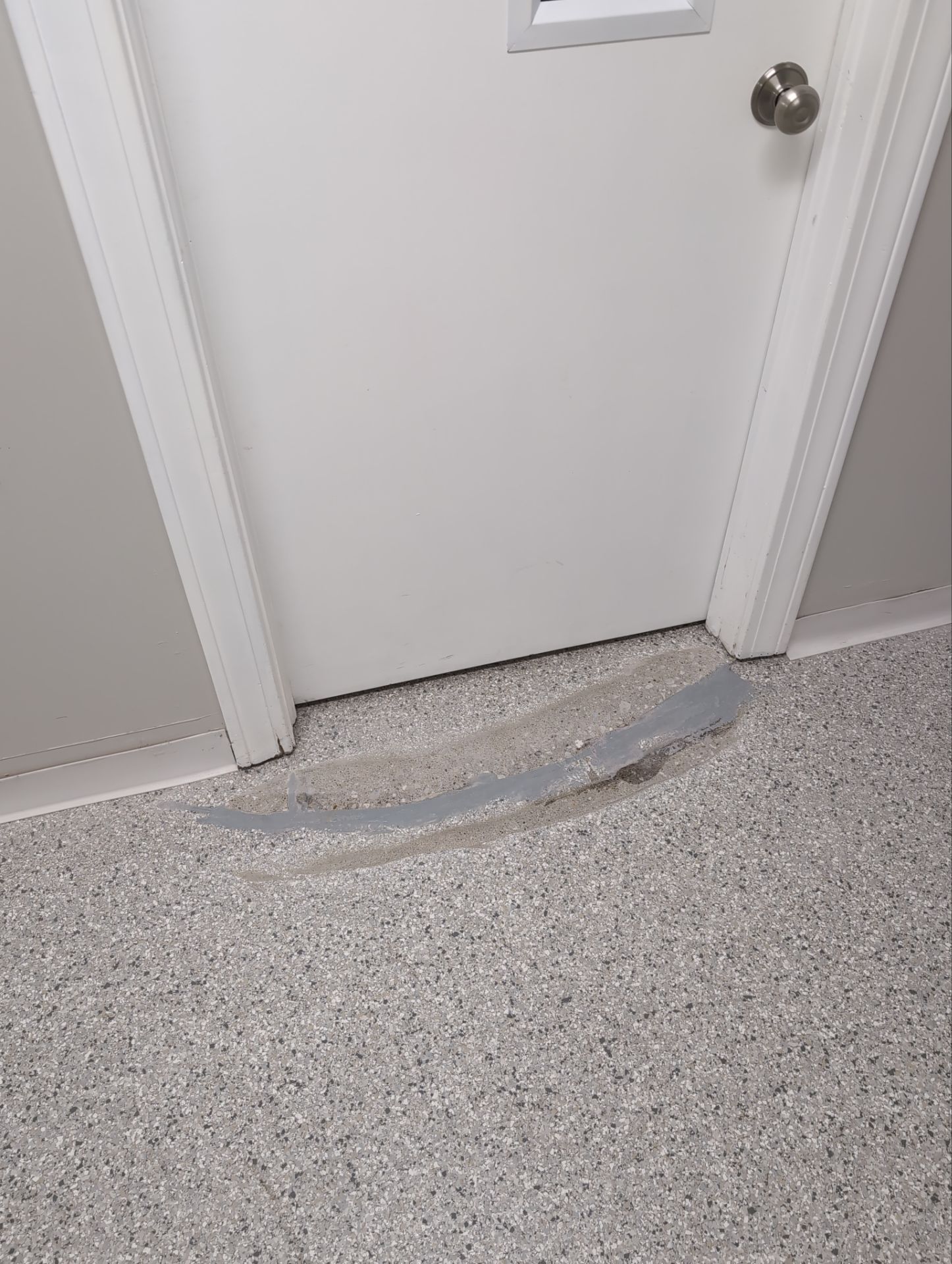 Medina Cracked basement floor with Epoxy by Beck Restoration Management Group