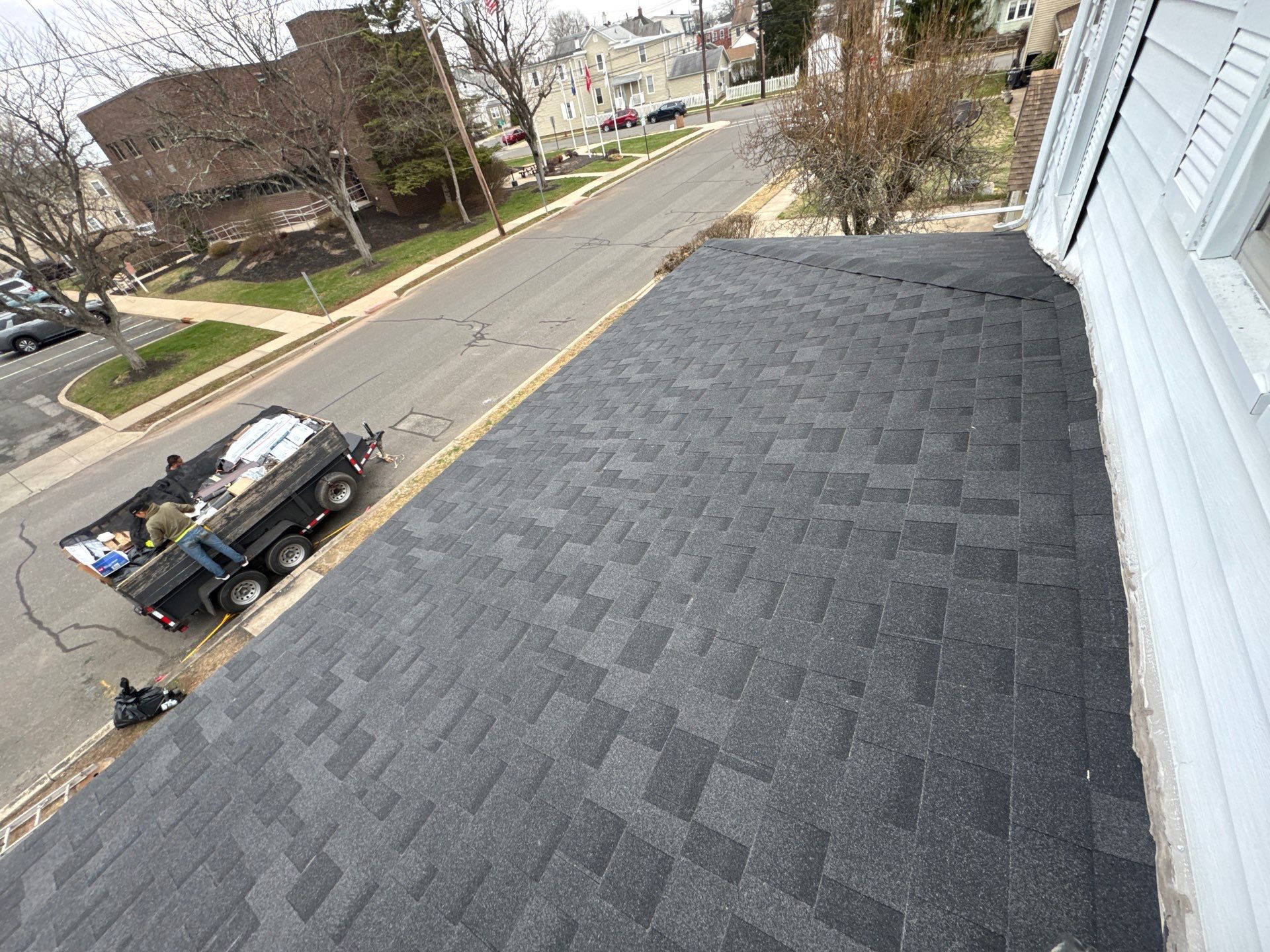 Onyx Black Shingles by Reimagine Roofing