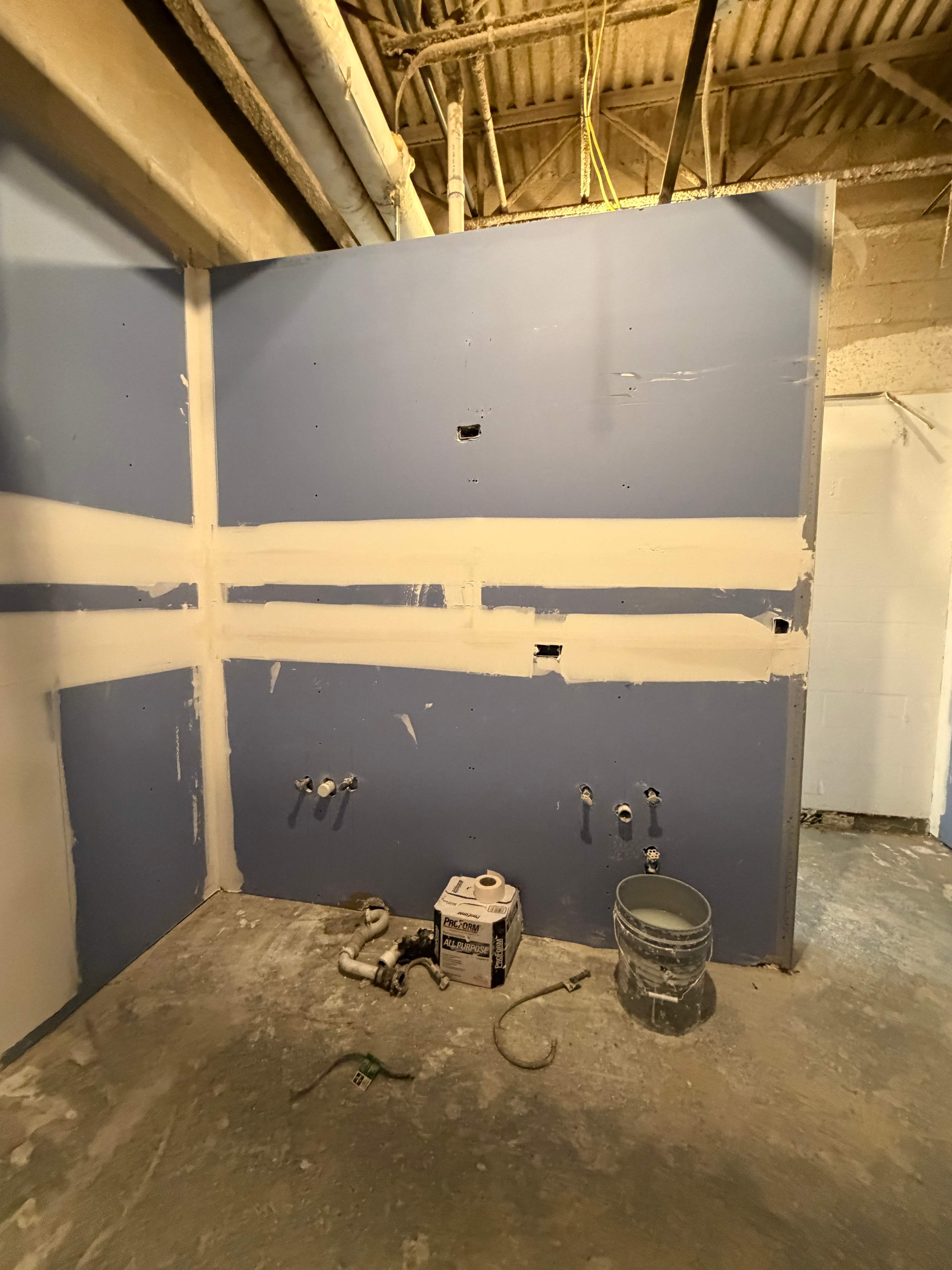 Commercial Restroom Renovation with Epoxy Flooring in Sarasota by Vertical General Contracting 