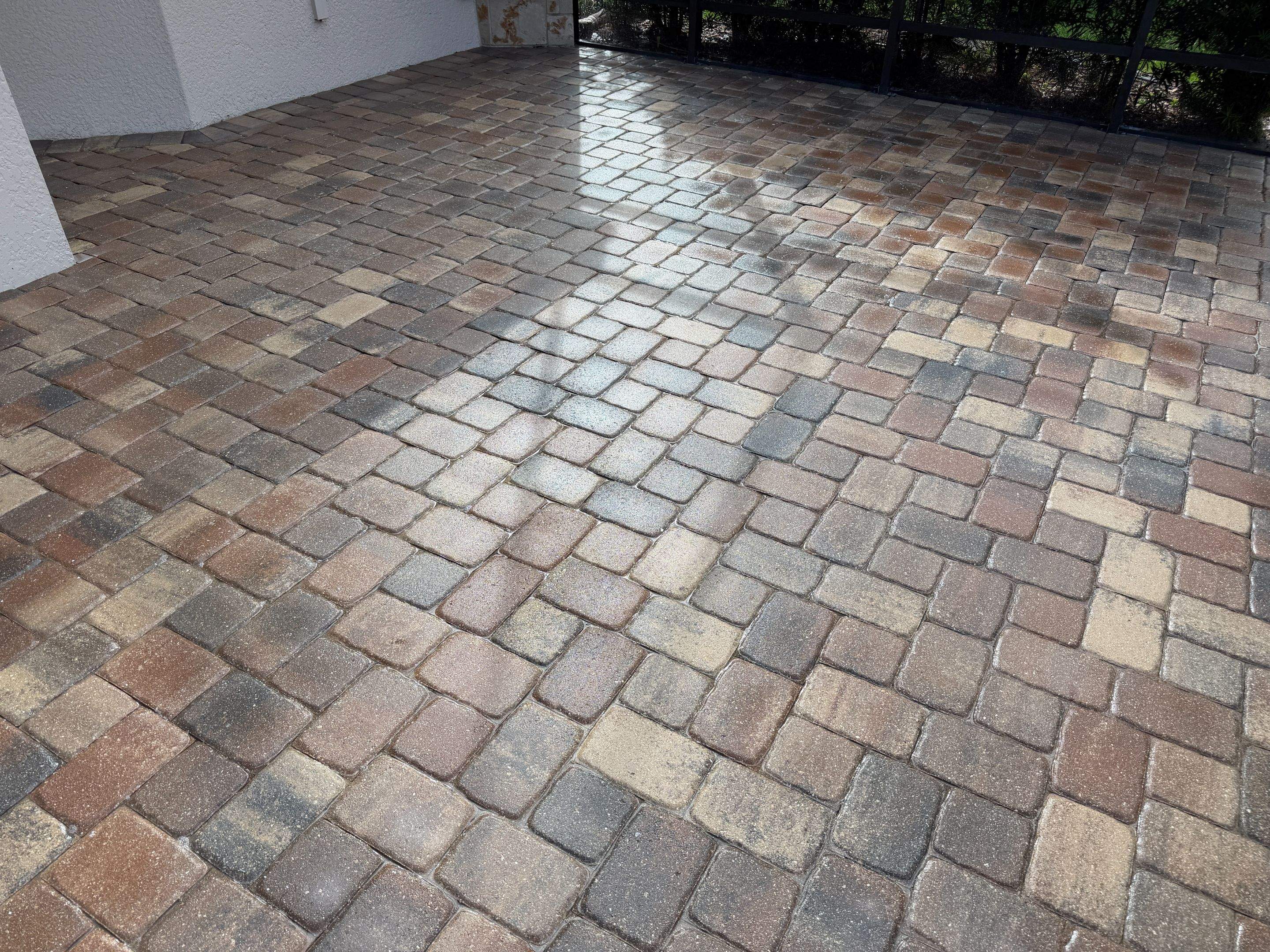 Valencia Lakes Screened-In Lanai Paver Restoration and Sealing in Wimauma by Supreme Paver Experts