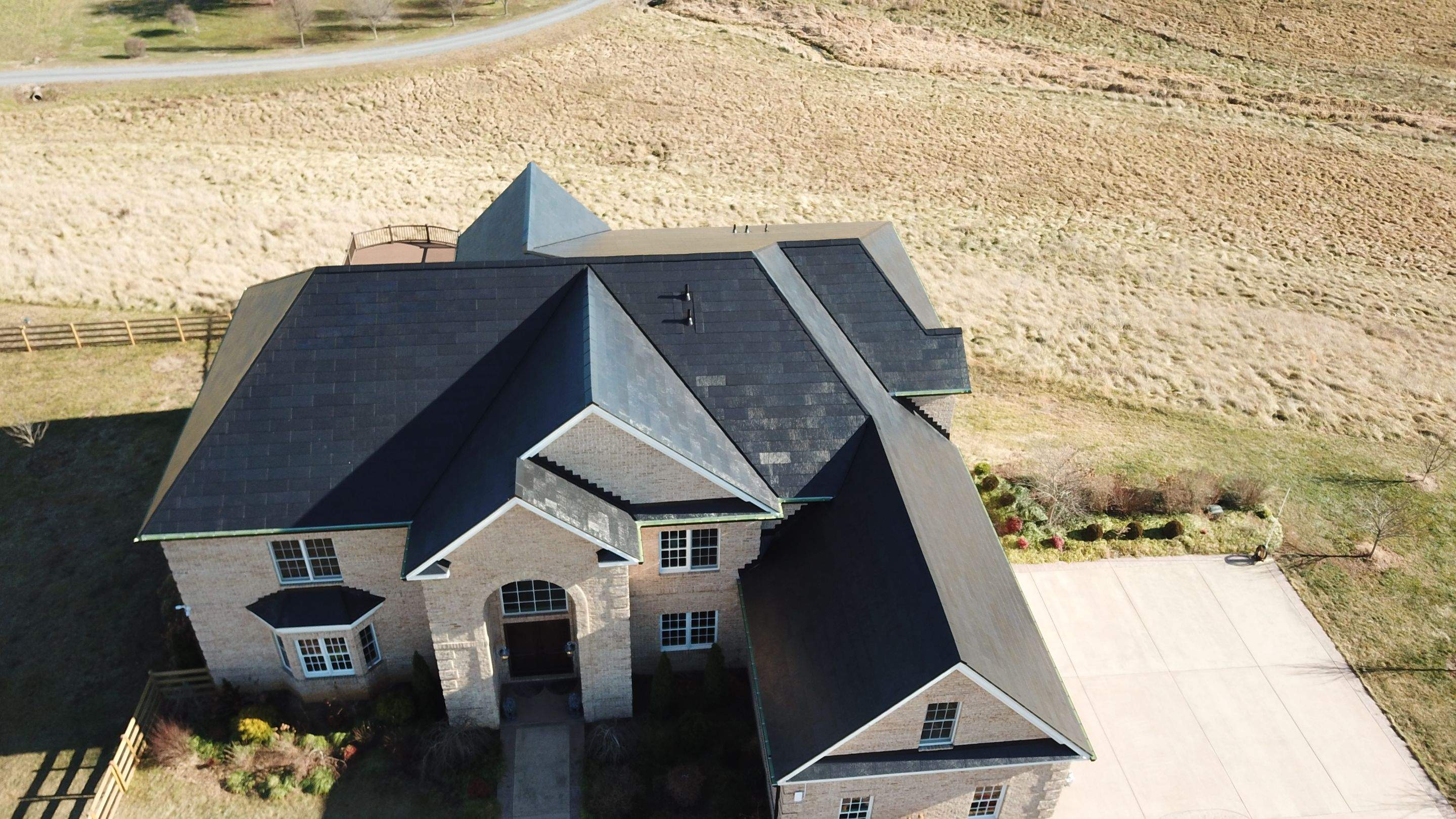 Tesla Solar Roof Replacement by American Home Contractors