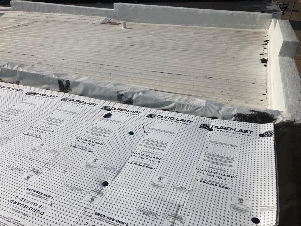 Recover of a downtown building  by Grell Roofing, LLC