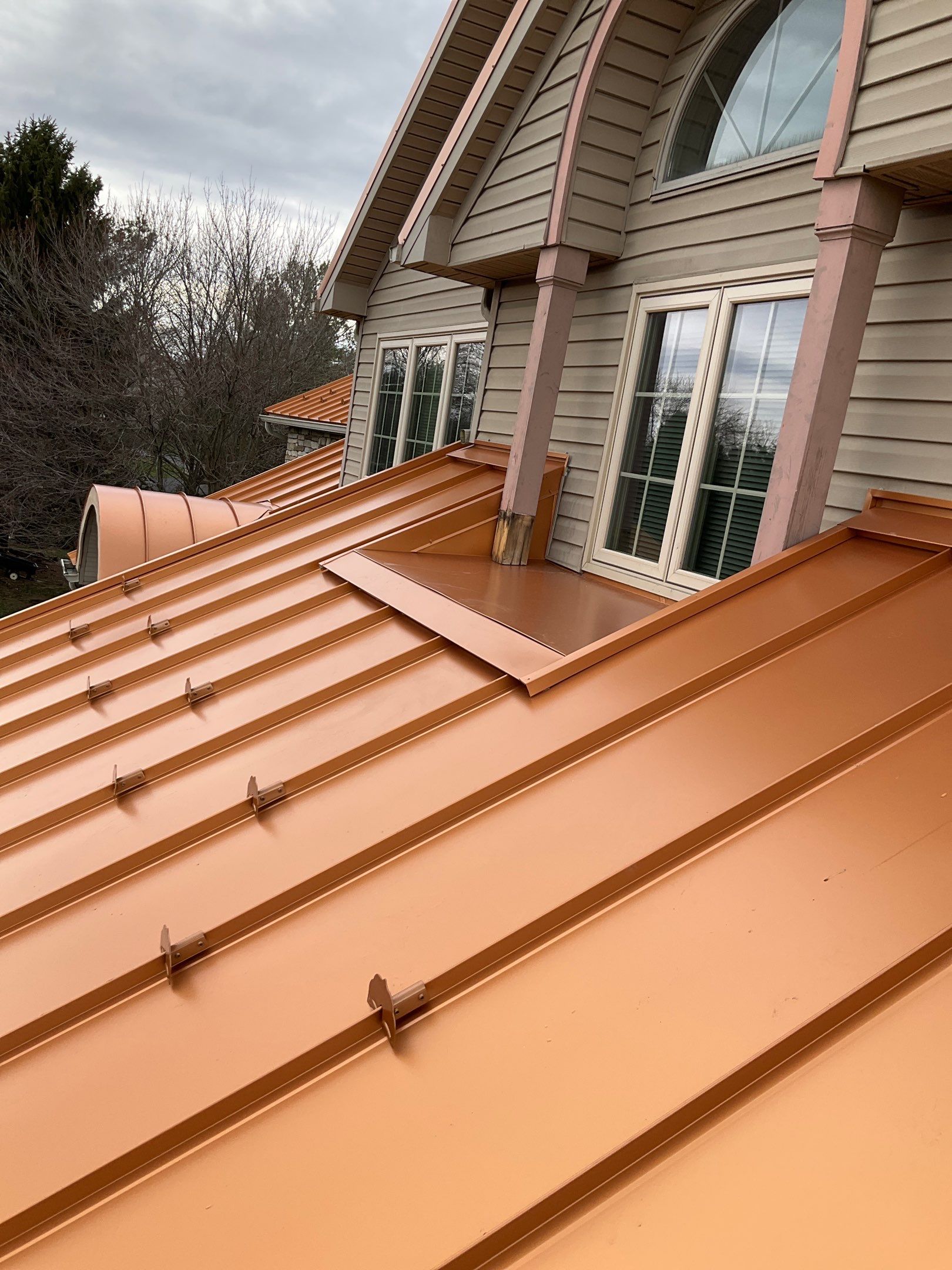 Standing Seam Roof – Copper Finish by Esh Builders