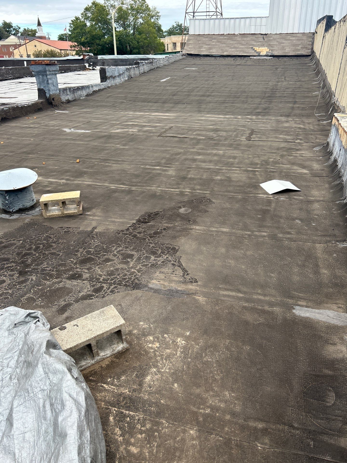 Downtown Gladewater Commercial Foam Roof Restoration – SPF + High-Tensile Acrylic by All Star Roofing LLC