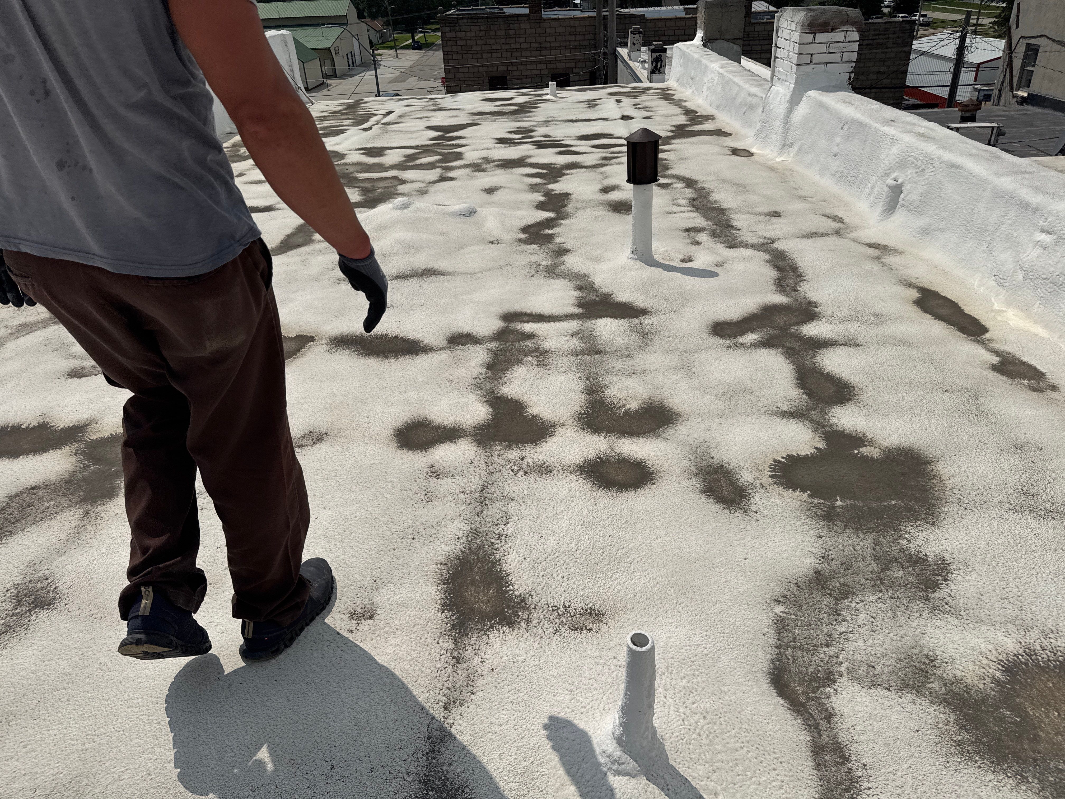 Commercial Flat Roof Elastomeric Coating and Repair in West Point by Crows Roofing LLC
