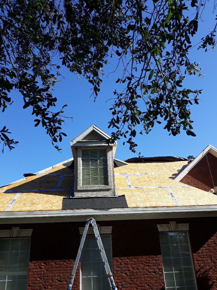 Residential Roofing Installation using Roof Replacement by American Roofing & Construction LLC