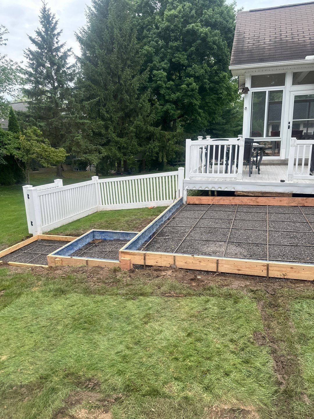 Majestic ashlar stamped concrete patio  by NG Masonry & Construction LLC