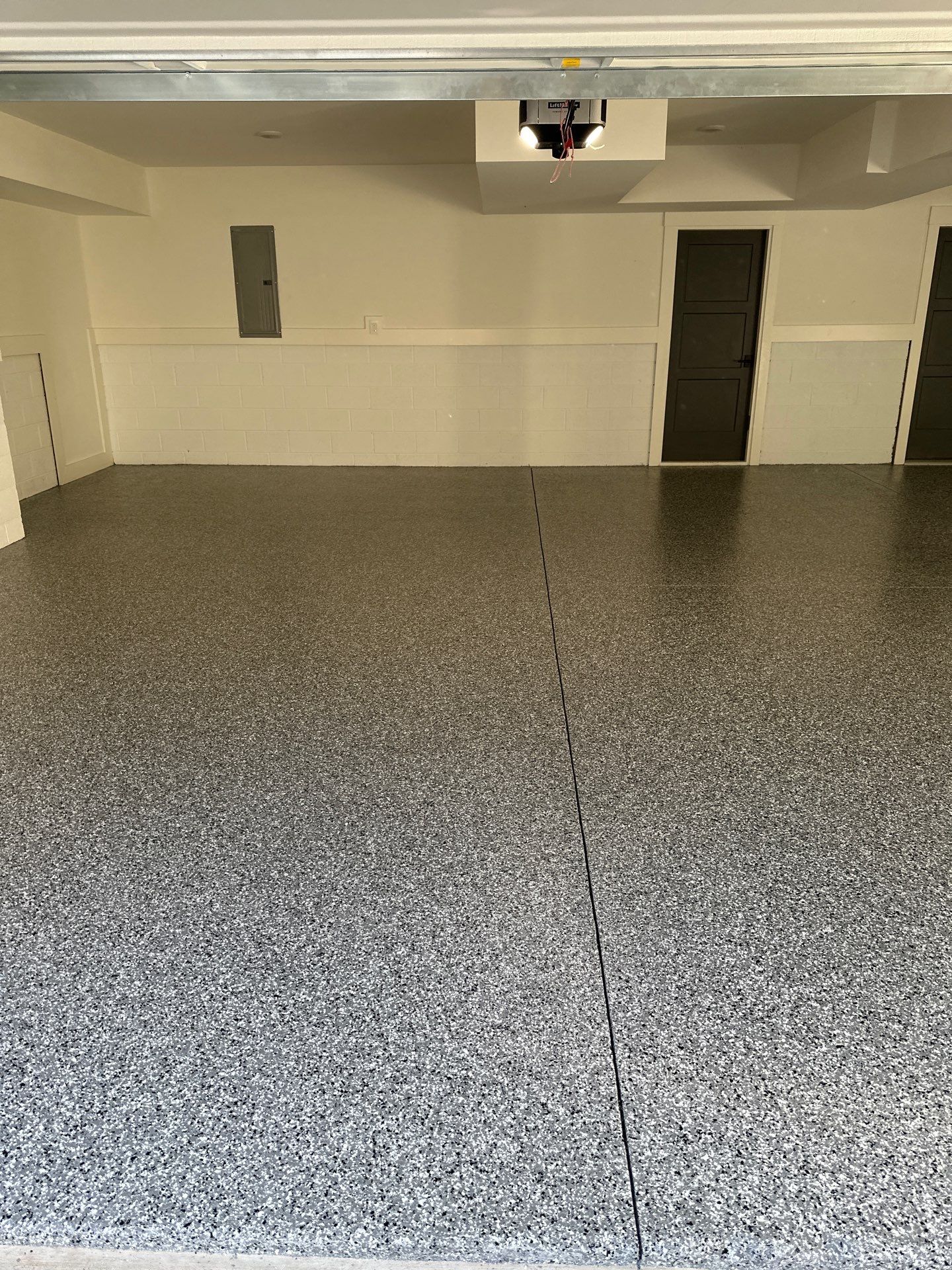 Garage Floor Coating using Wombat by My Garage Floor Guys