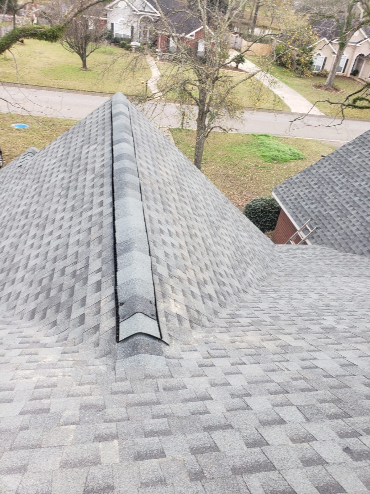 Residential Roofing Installation using Roof Replacement by American Roofing & Construction LLC