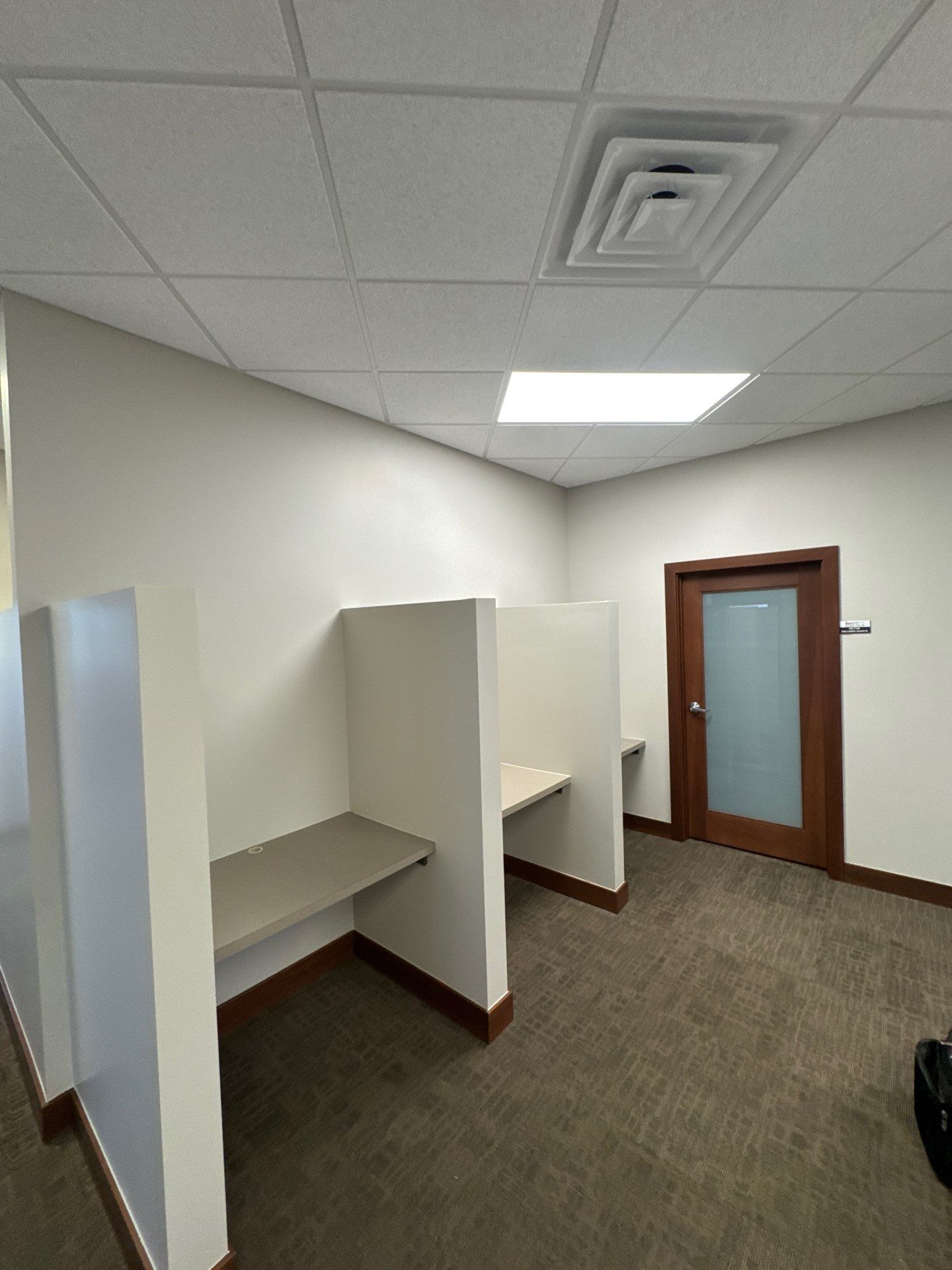Commercial Office Interior Remodel and Modern Suite Refresh in Sioux Falls by Select Painting, Coatings & Garage Cabinets