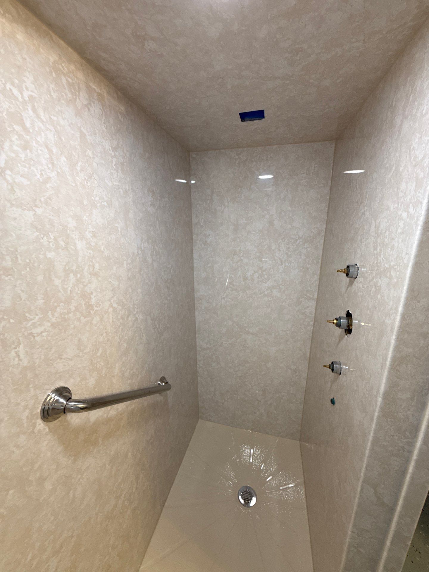 Acrylic Walk-In Shower Installation with Marble Patterns in Williamsburg by Rainbow Seamless Systems