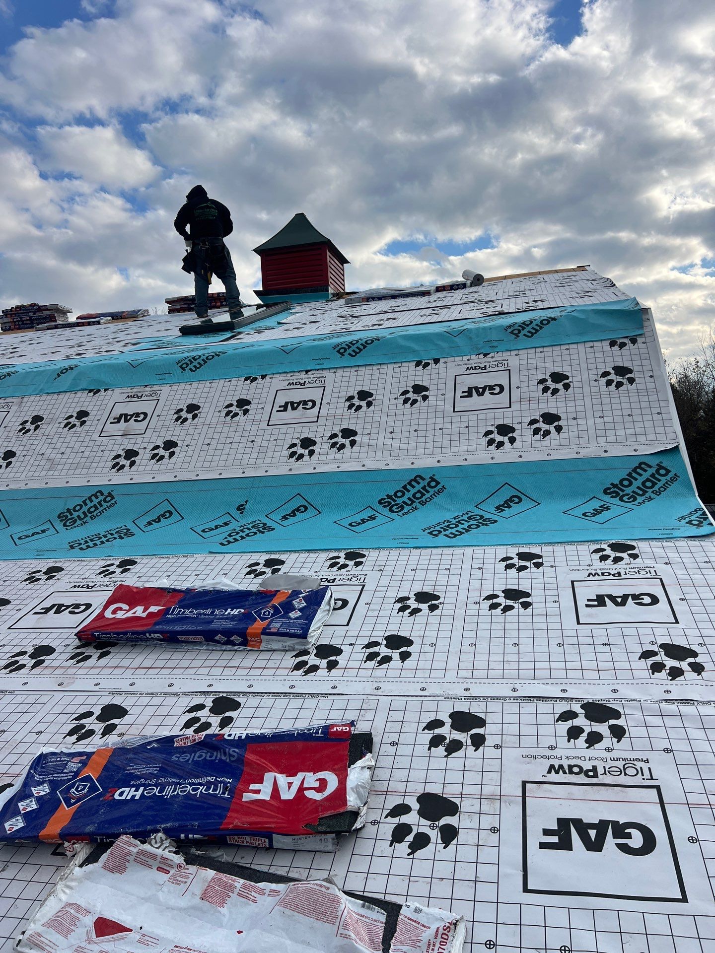 Residential Roofing Replacement with Multiple Skylights in Mason, Michigan by Acme Exteriors