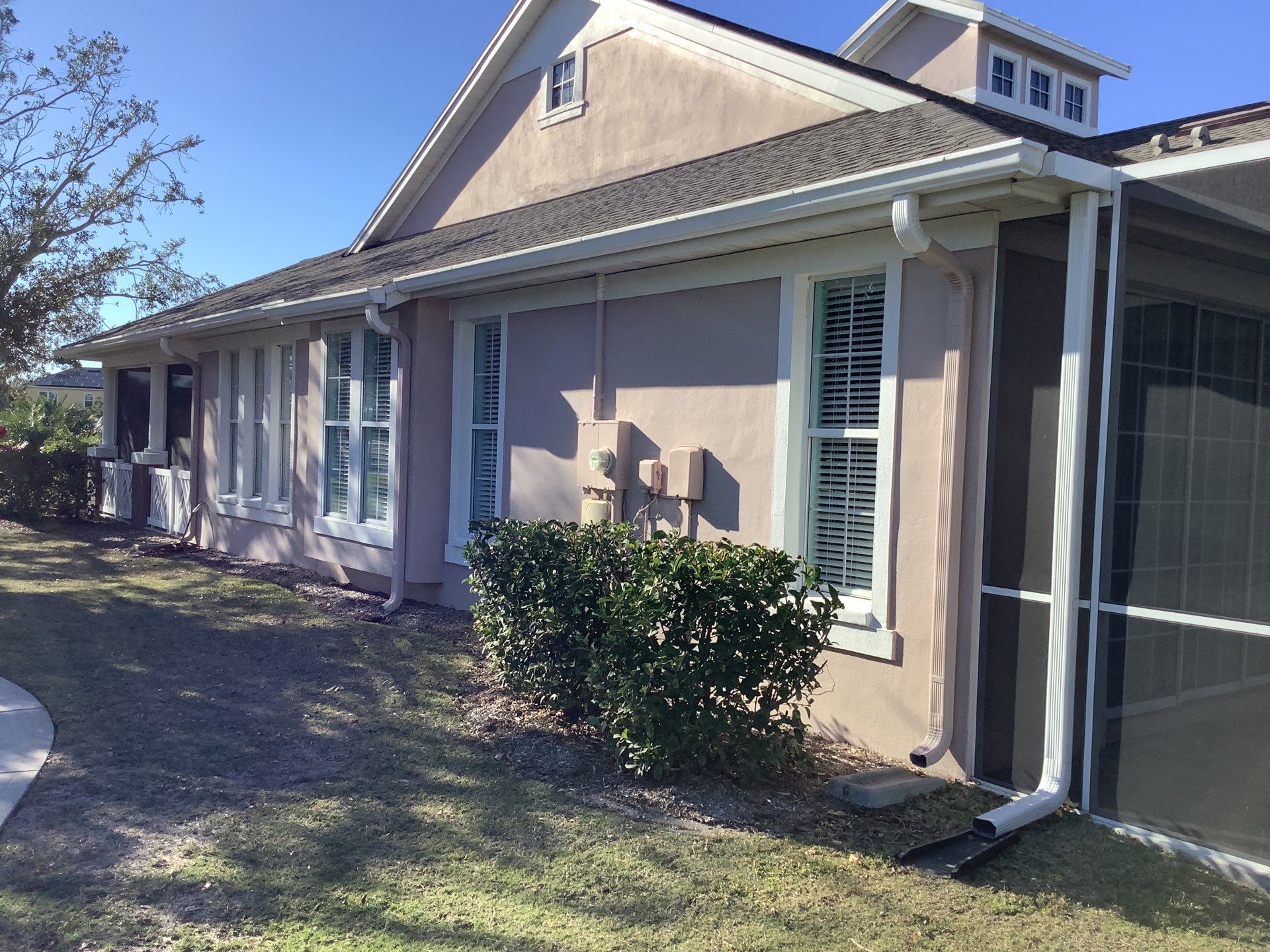 Splash Guard Gutters for Homes in Apollo Beach FL by Gutter Professors