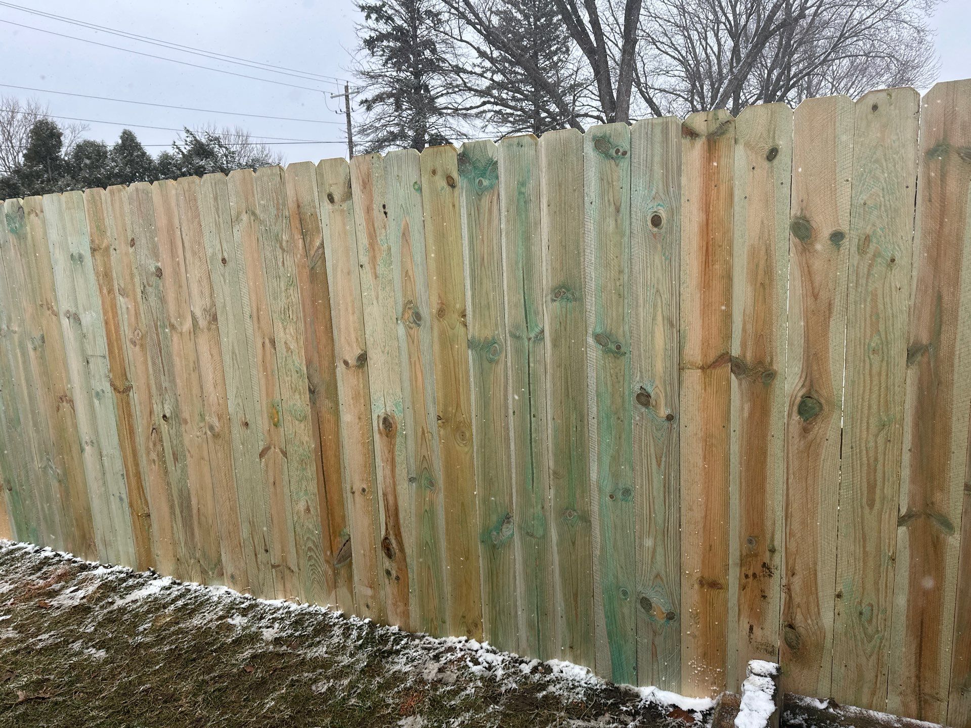 Pressure-Treated Wood Privacy Fence Replacement in Waterloo by Perfect Picket Fence and Stain