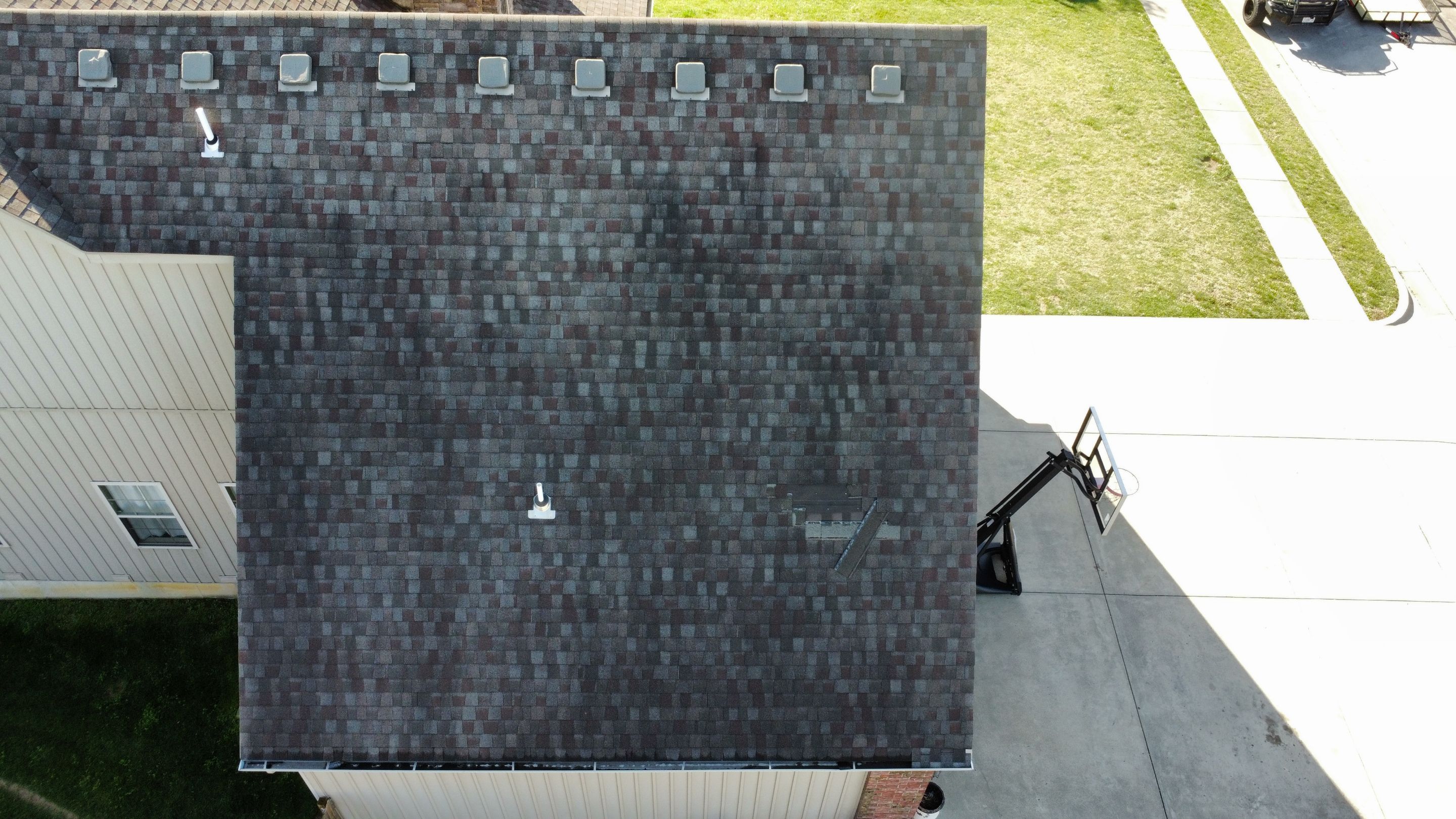 Residential Roof + Gutters & Downspouts Install  by Titan Commercial & Residential Roofing 