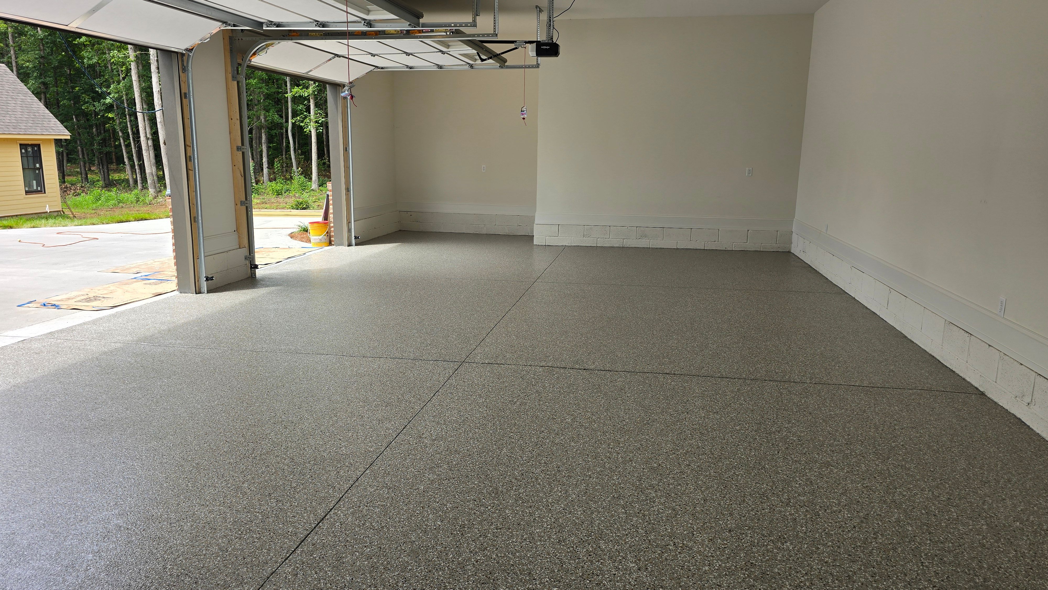 Garage Using Creekbed  by Elite Floor Solutions