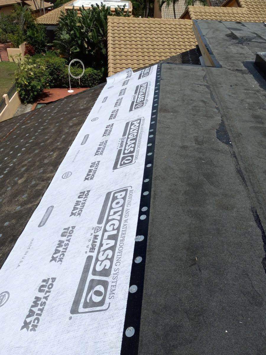 Complete Chimney Rebuild + Tile & Flat Re-Roof  by Morton Roofing, Inc.