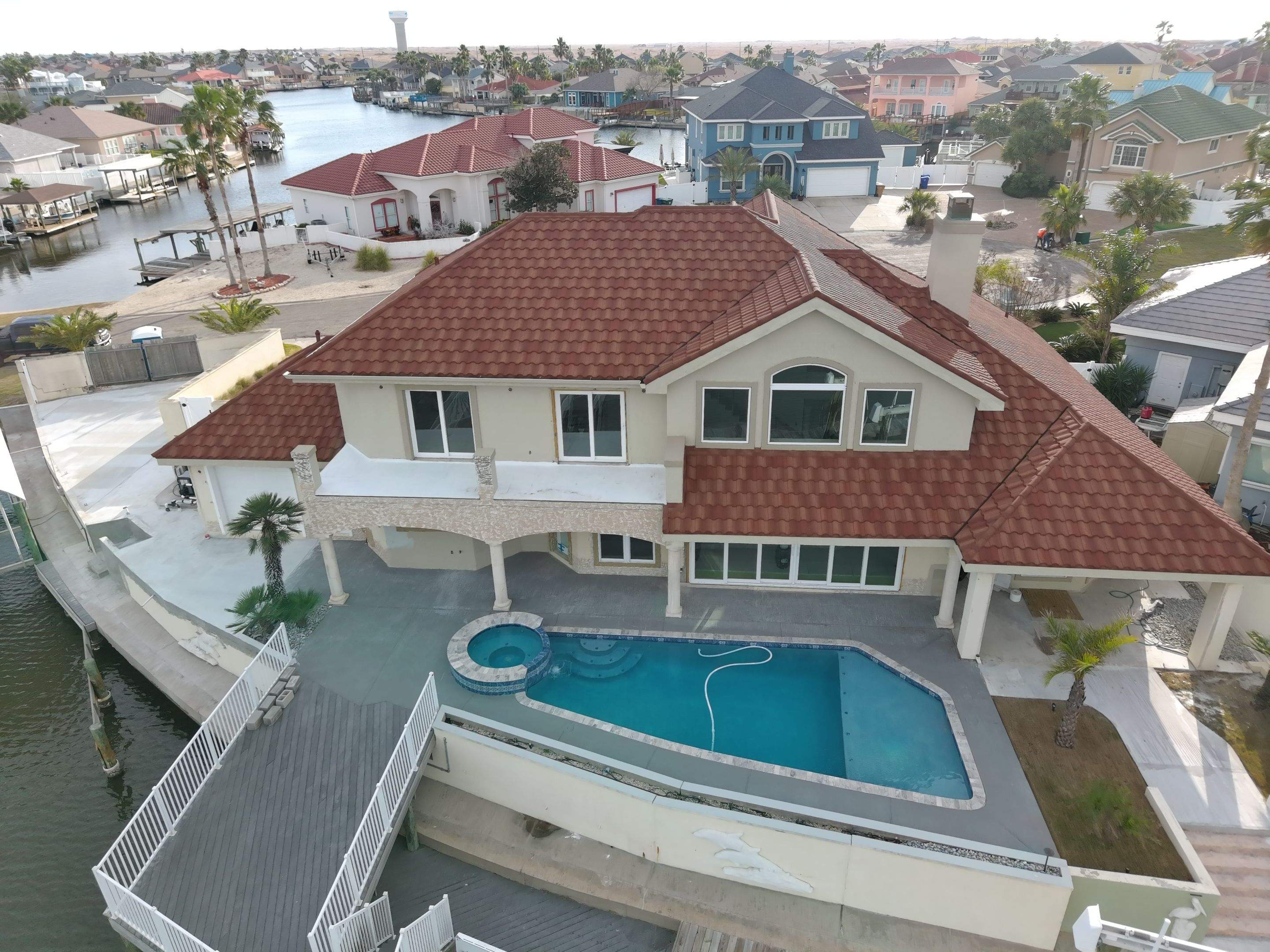 Isla Colon Mediterranean Makeover by Bayfront Roofing and Construction