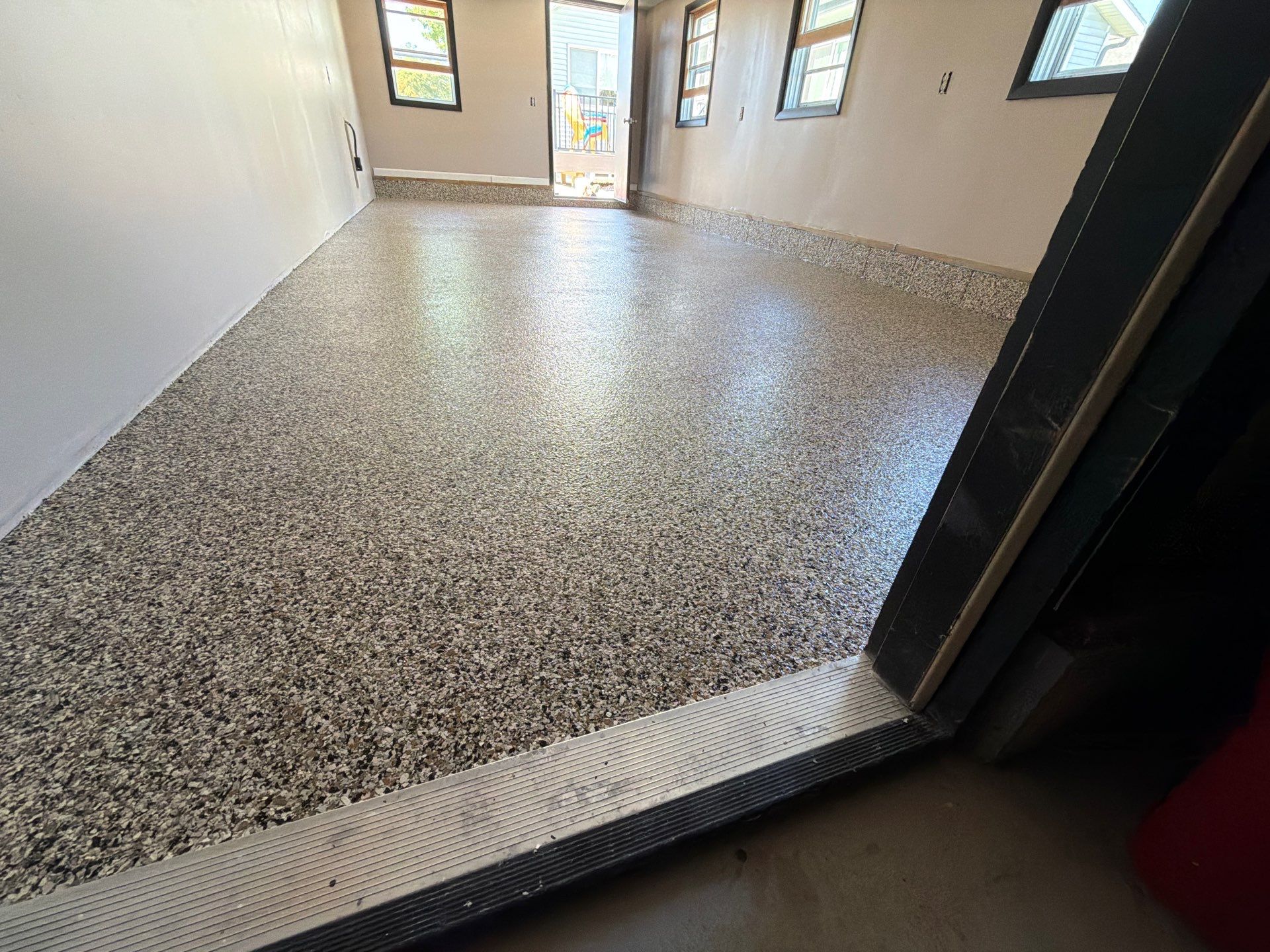 Epoxy Flake Garage Floor & Foundation Refresh – Seamless, Durable, and Clean Finish by Gordon Painting