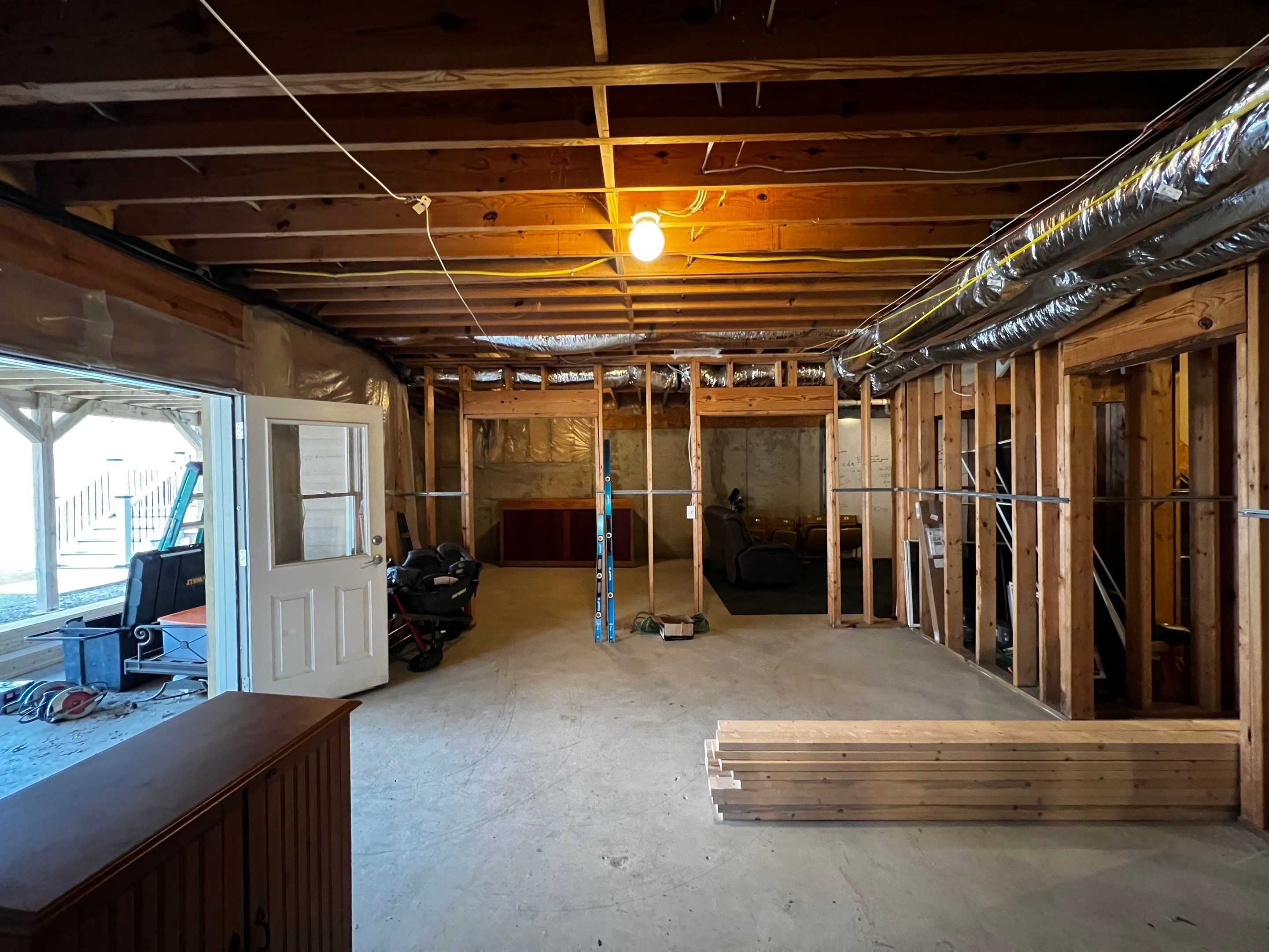 Custom Basement Remodeling With Home Theater and Bar in Woodstock by Swift Home Renovations