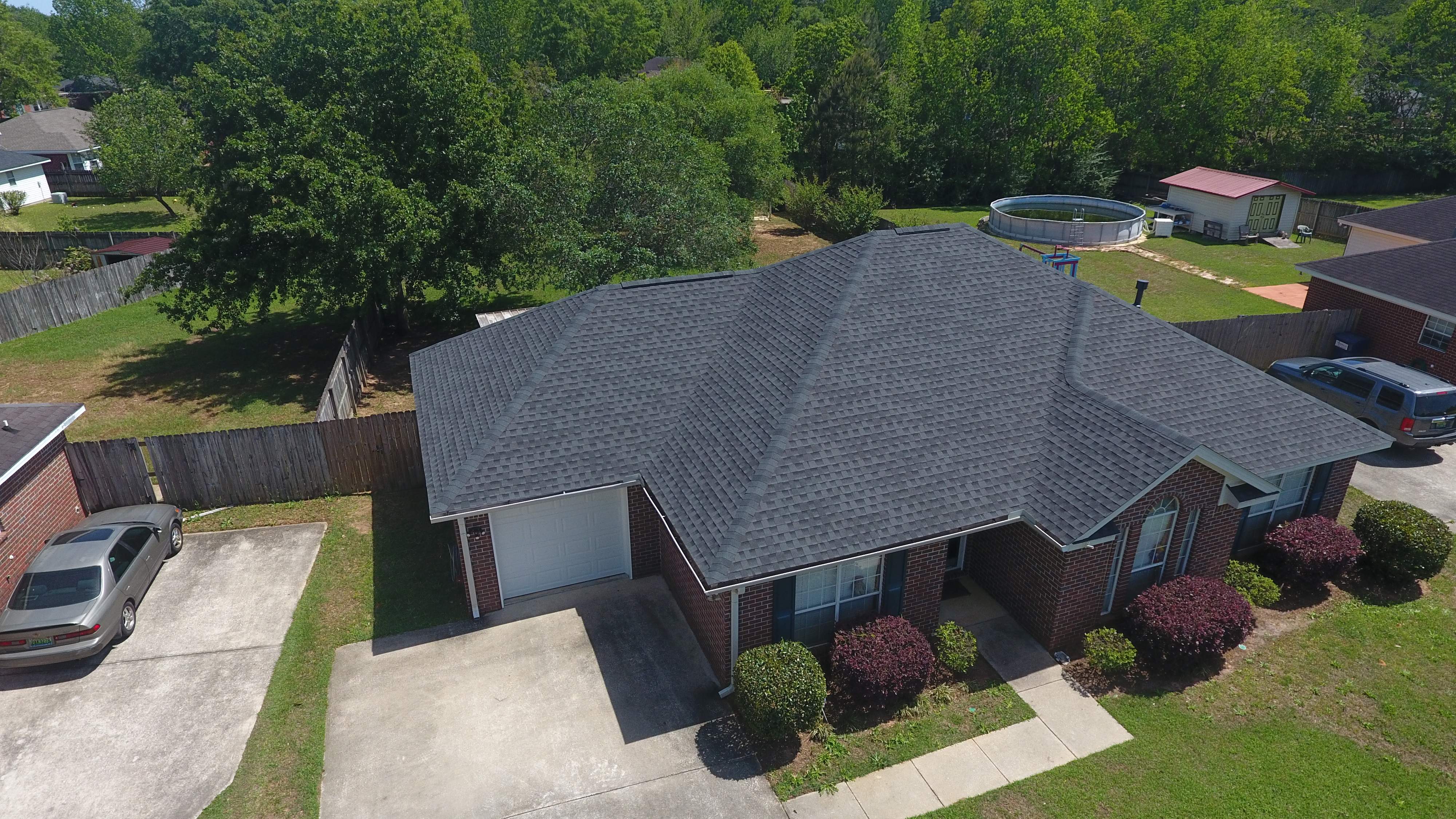Residential Roofing Installation using Roof Replacement by American Roofing & Construction LLC