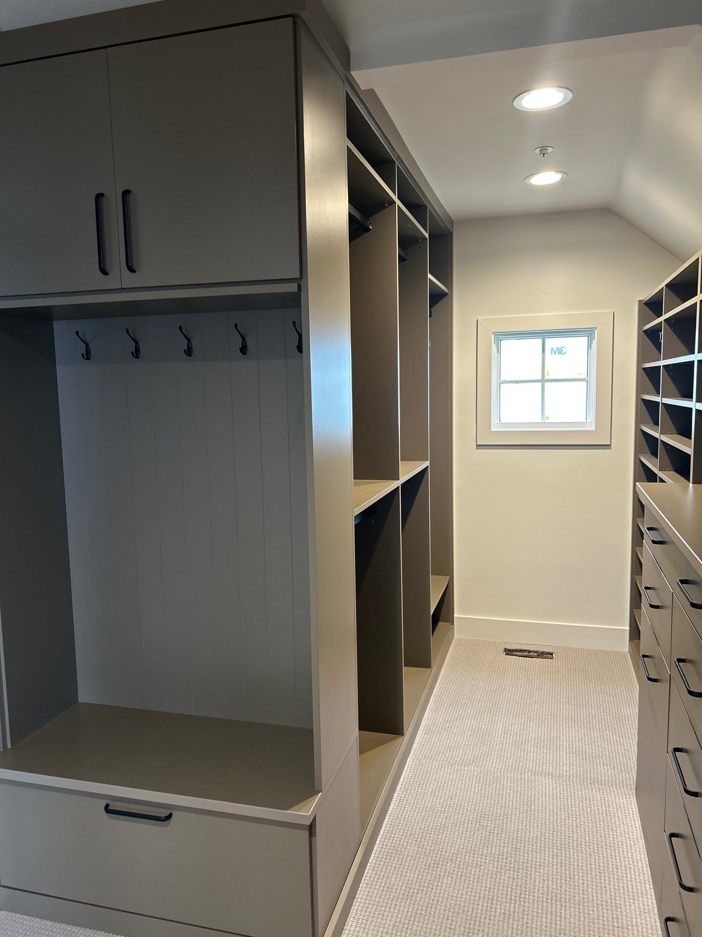 Enjoy a Morning Latte in this Walk-in Closet by Concept 32, Inc.