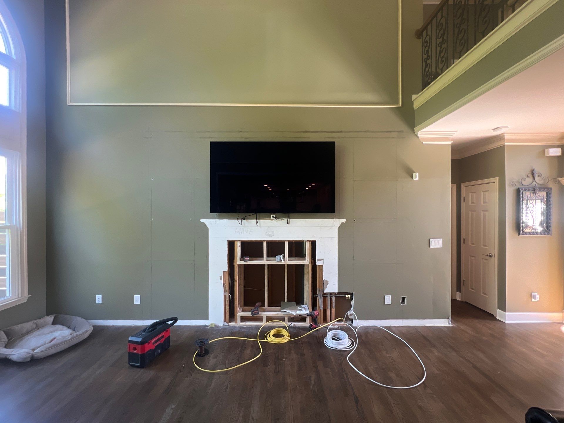 Custom Stone Fireplace and White Built-in Cabinetry in Suwanee by Swift Home Renovations