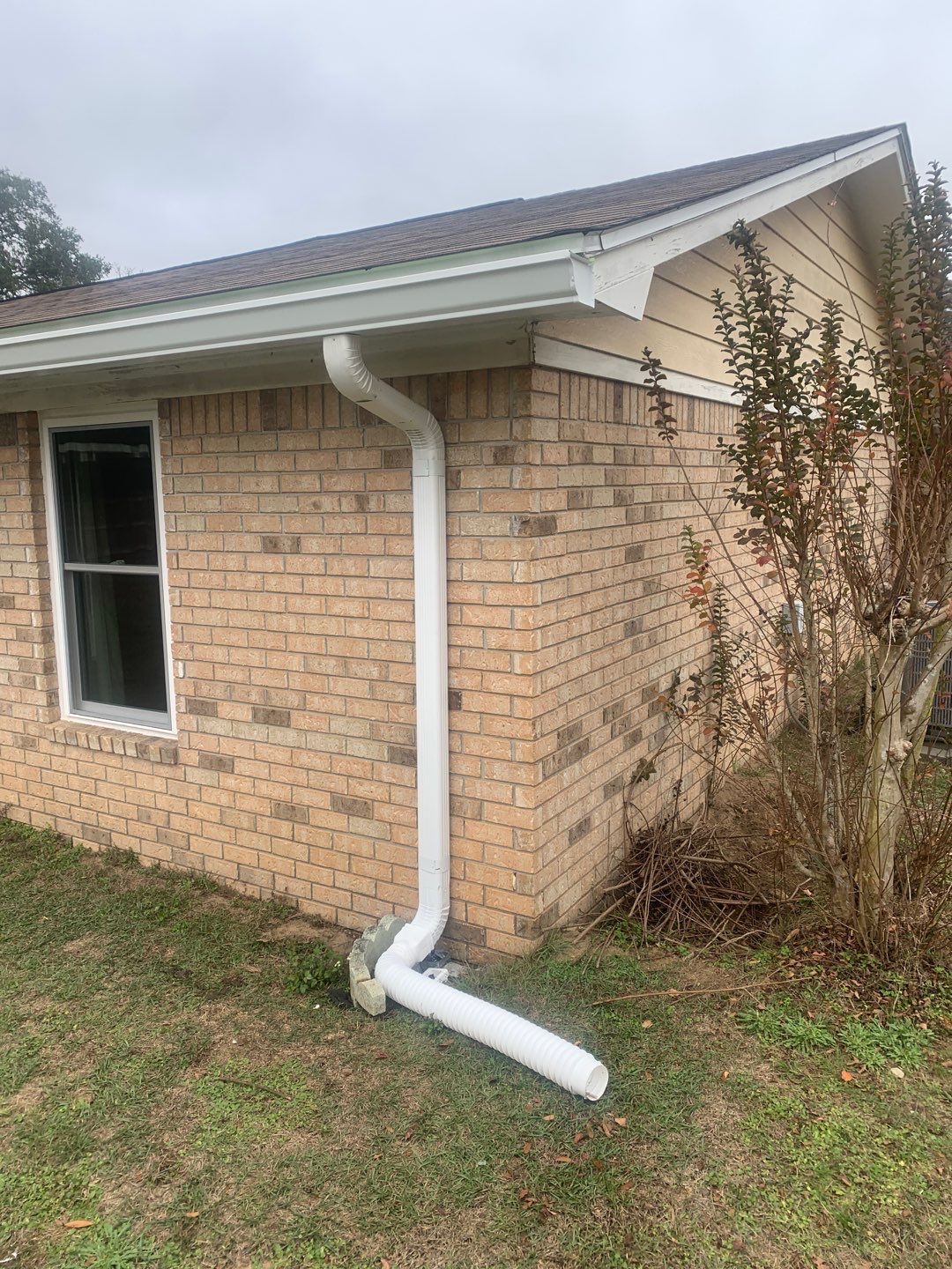 White Seamless Gutter Installation in Milton FL by Gutter Professors