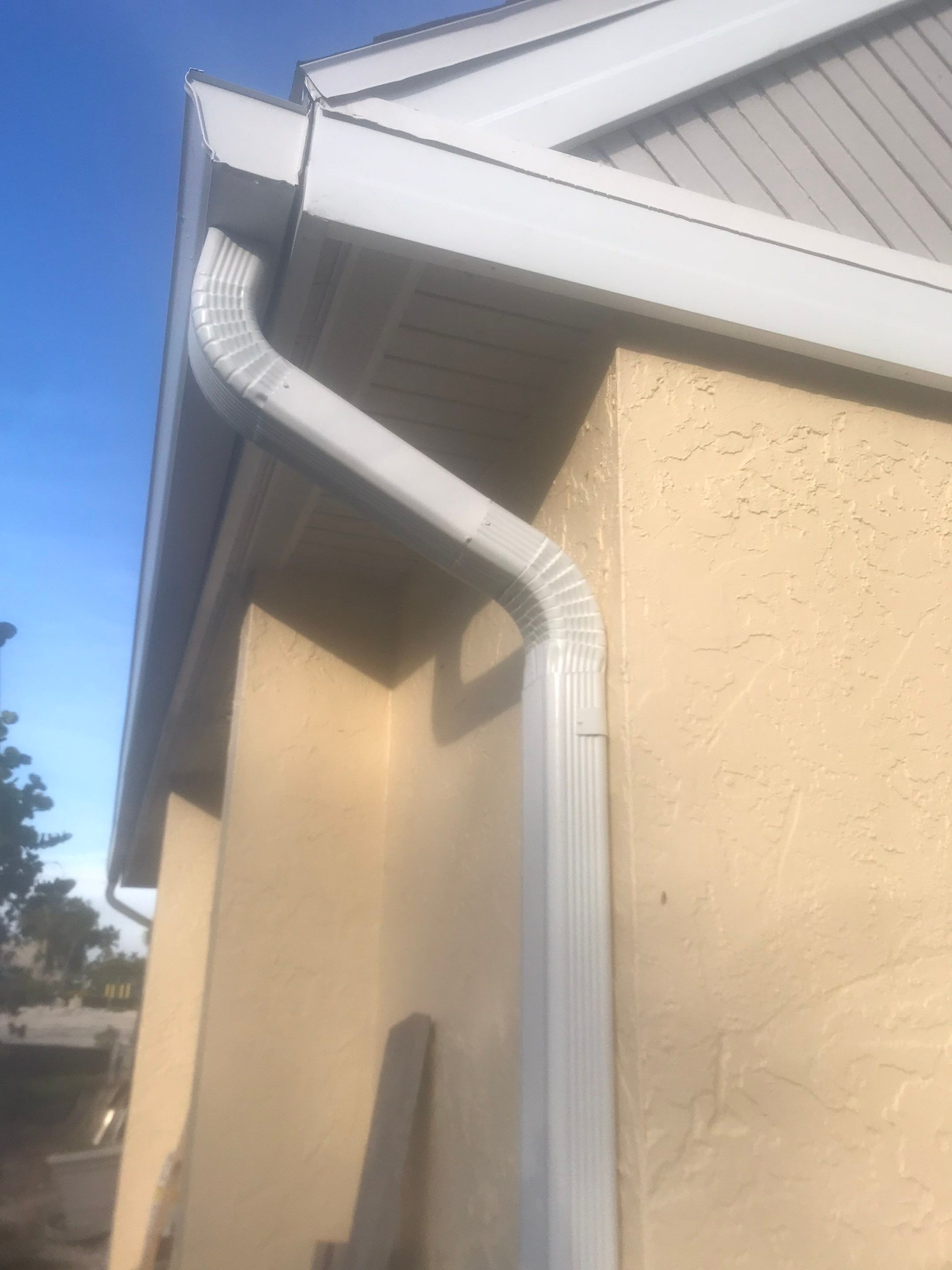 K-Style Seamless Gutter Installation using White Seamless Gutters in Sanibel FL by Gutter Professors