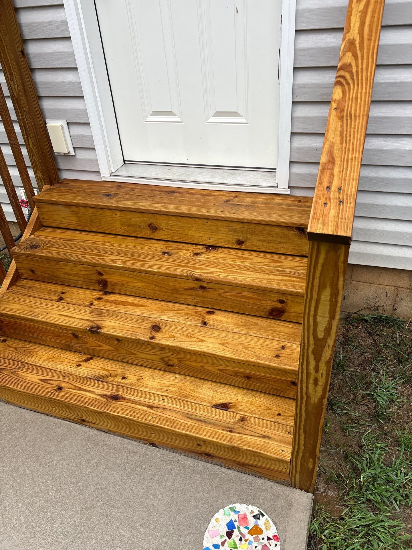 Wood Deck and Concrete Walkway using Wood and Concrete Sealant by DuraSeal