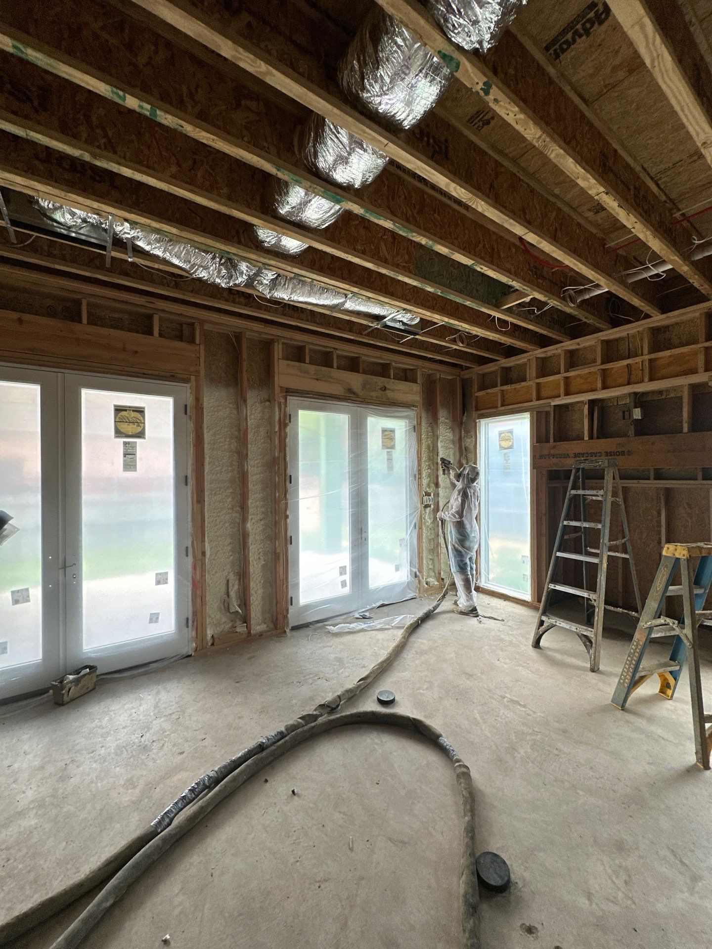 Open cell spray foam job completed at this beautiful custom home in Dallas TX by Apex Insulation Solutions