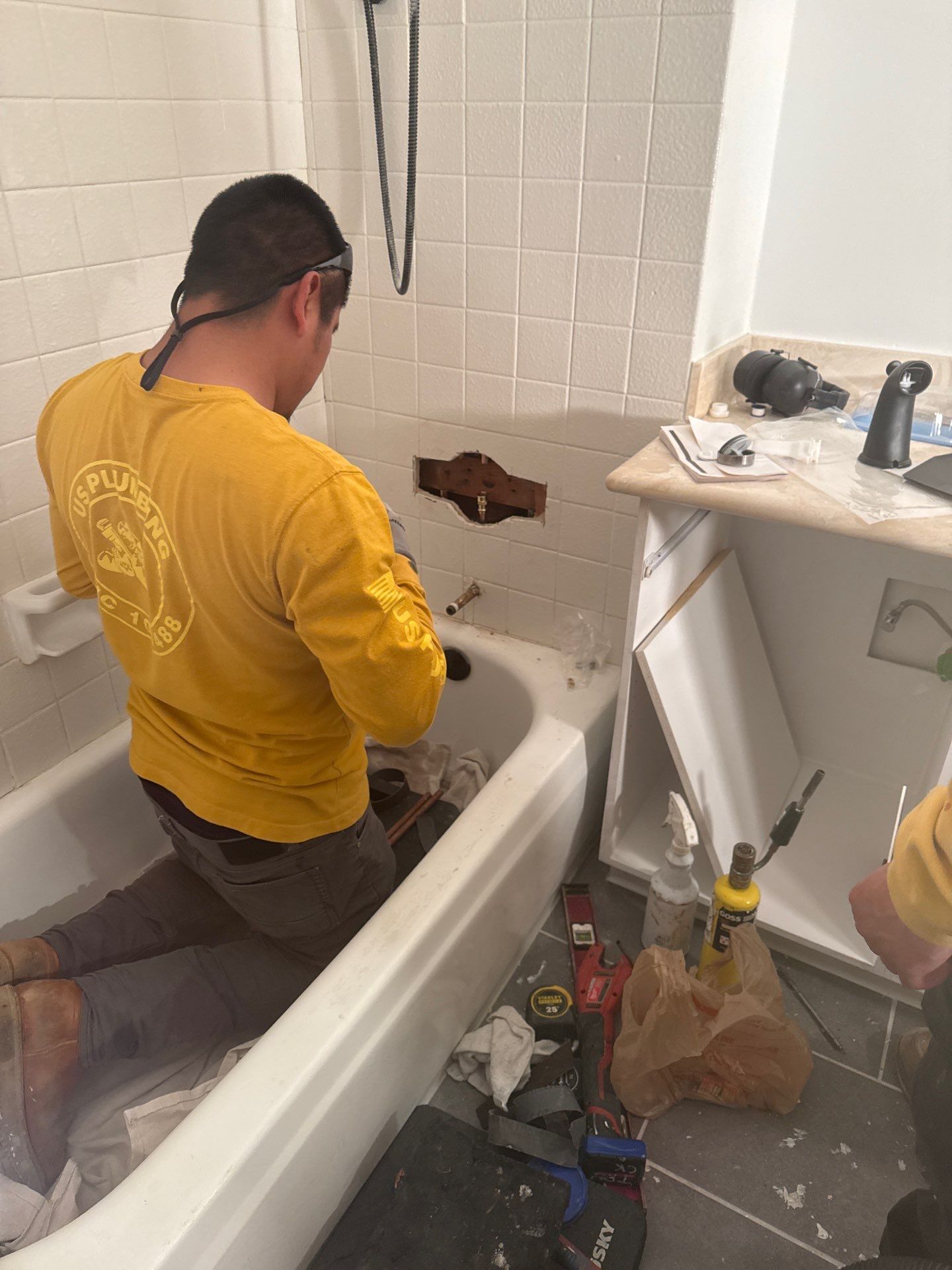 Installing Shower Fixtures  by Us Plumbing 