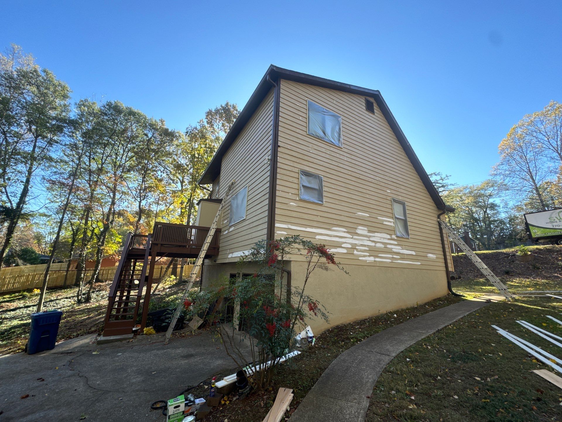 Full Exterior Siding and Trim Painting in Kennesaw by Swift Home Renovations