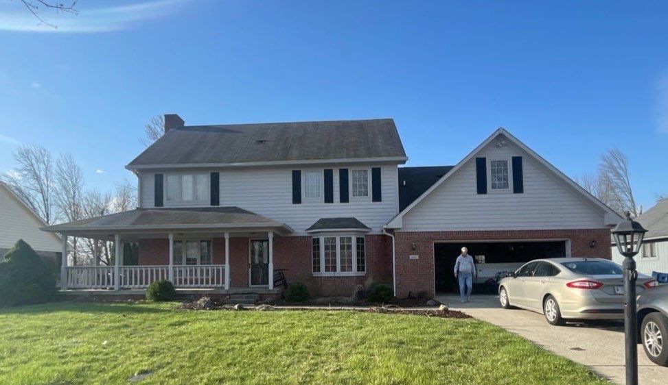 Tornado damage in Whiteland. Roof replacement, James Hardie siding, exterior paint, gutters, windows, doors by 317 Roofing & Restorations