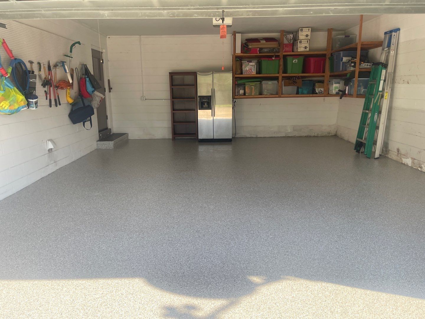 Garage with Cabinets in Gainesville, FL in Mount Everest by Cross Creek Concrete Coatings
