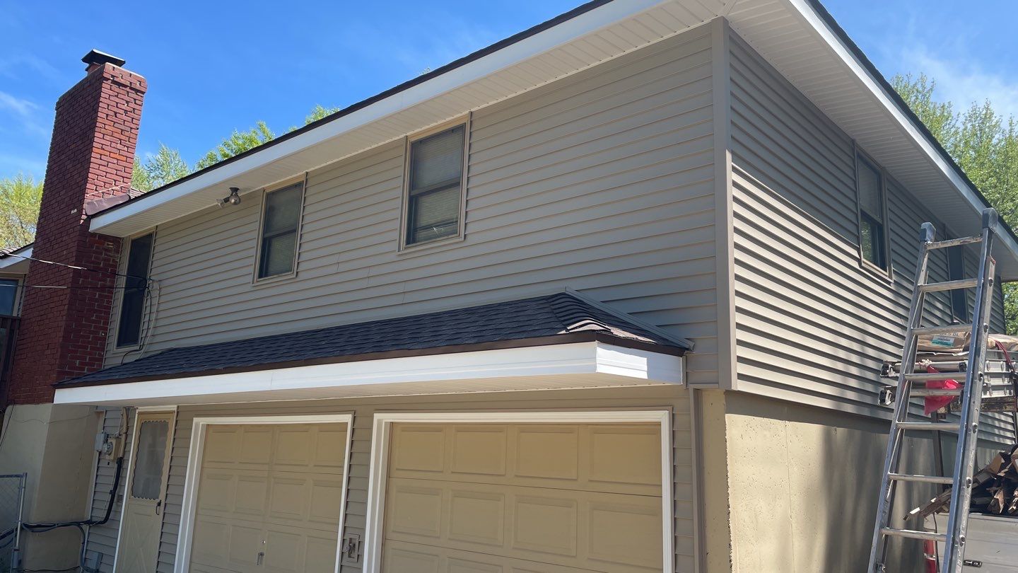 Residential Roofing Installation and adding our Premium Point  by EEC  Windows, Siding & Roofing 