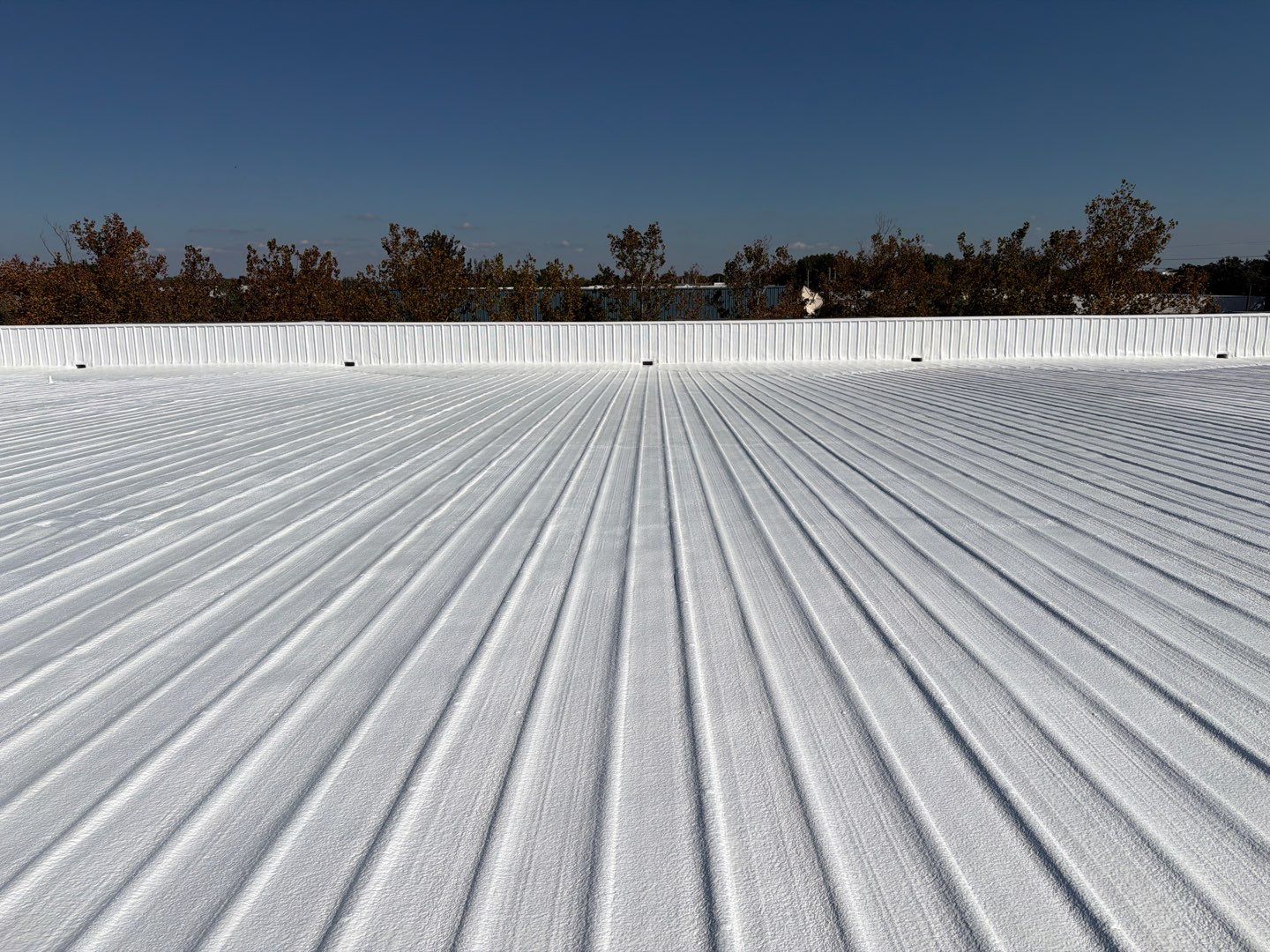 Orlando Commercial Metal Roof Restoration and Silicone Coating System by CES Roofing