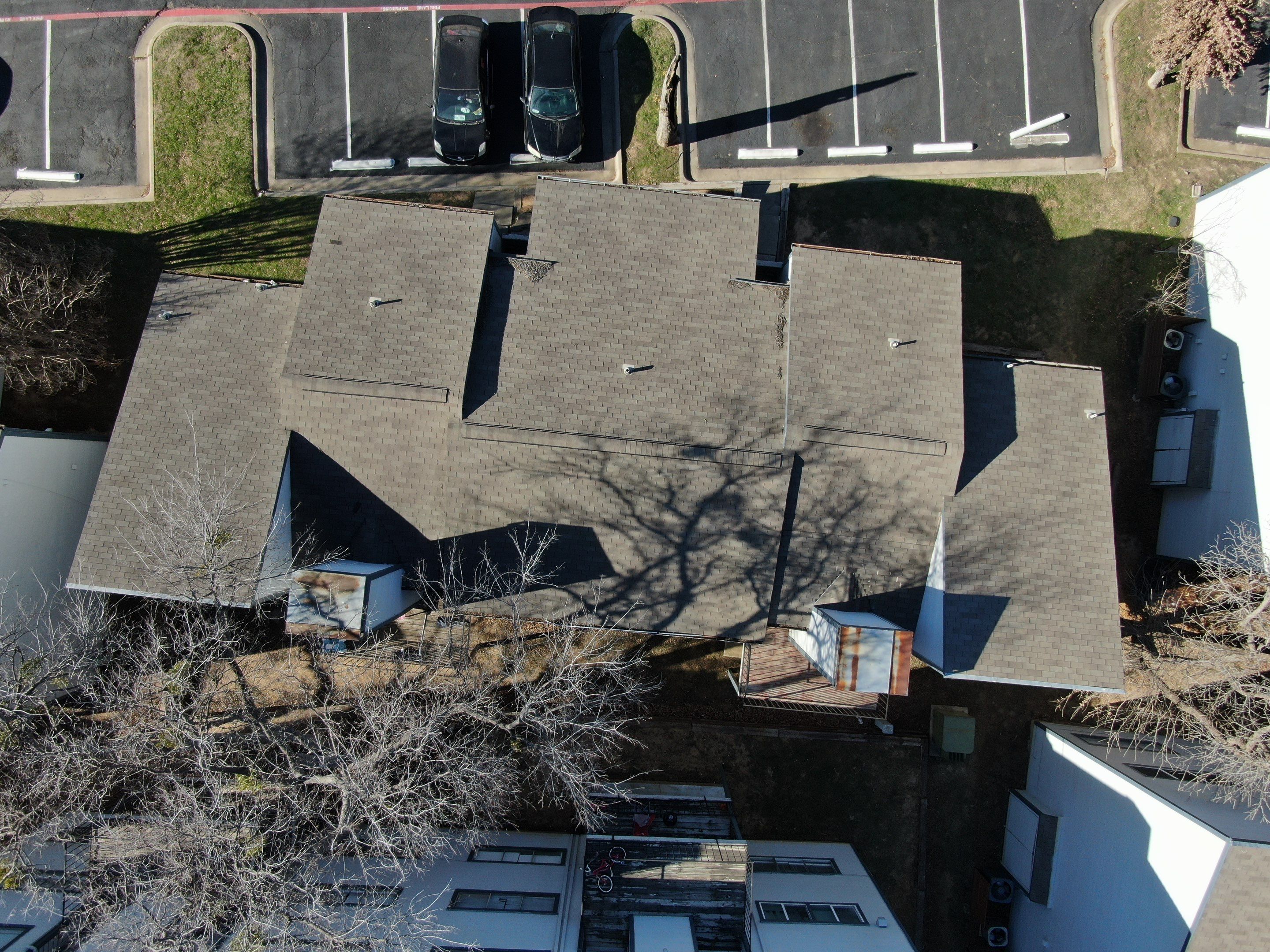 Apartment Roofing Repairs using Certainteed xt25 by Becker Roofing and Exteriors