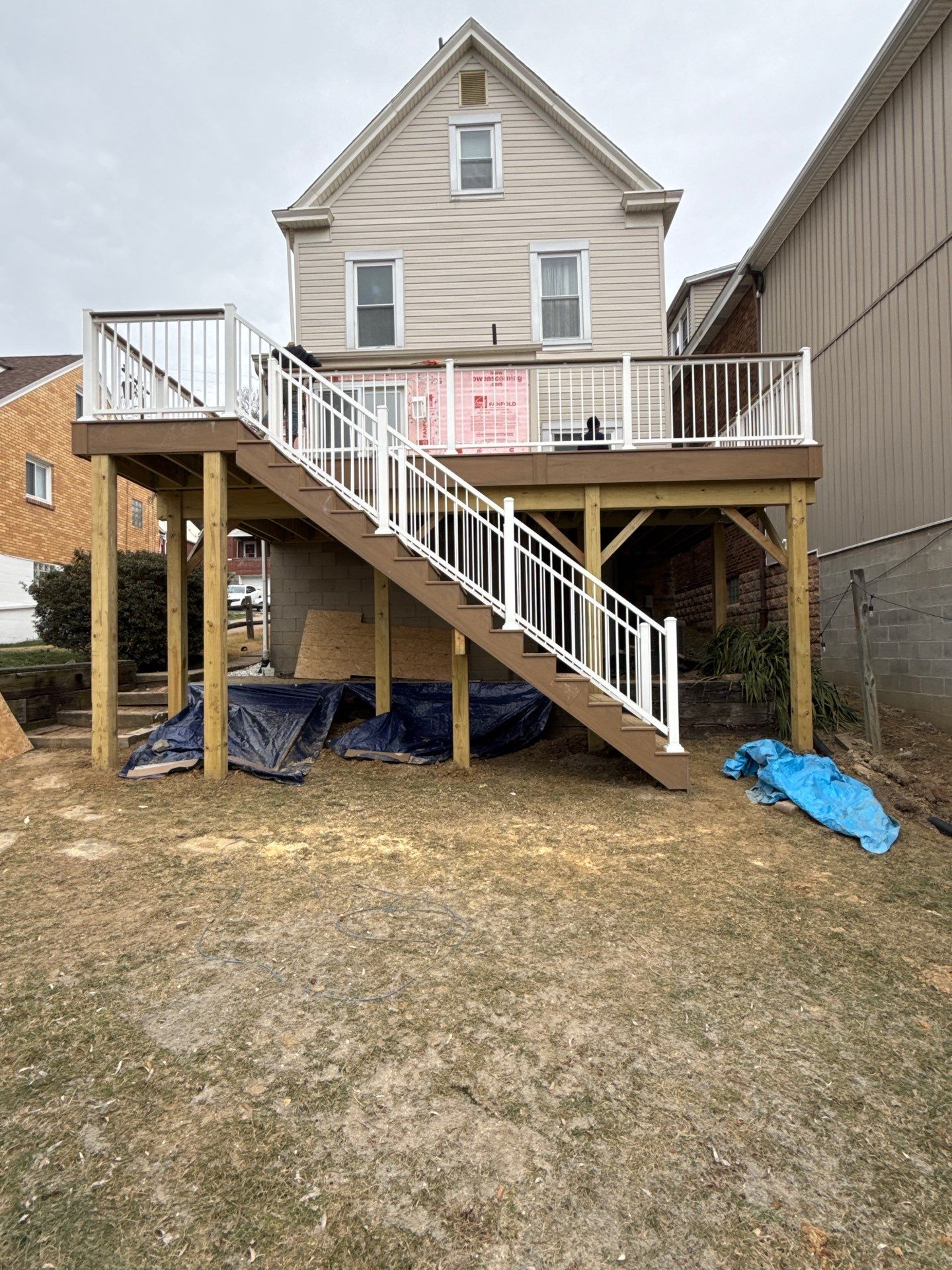Deck and door by Cousins Roofing Siding & Decks