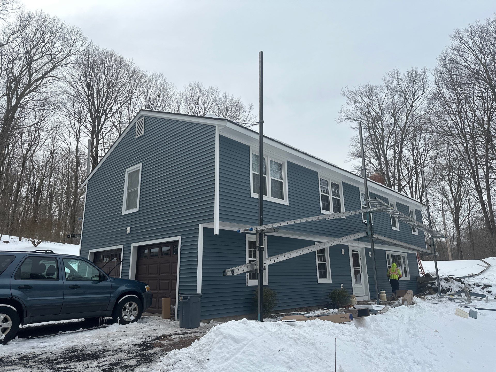 Siding Installation using CertainTeed Mainstreet Vinyl Siding - Pacific Blue by A Plus Exterior