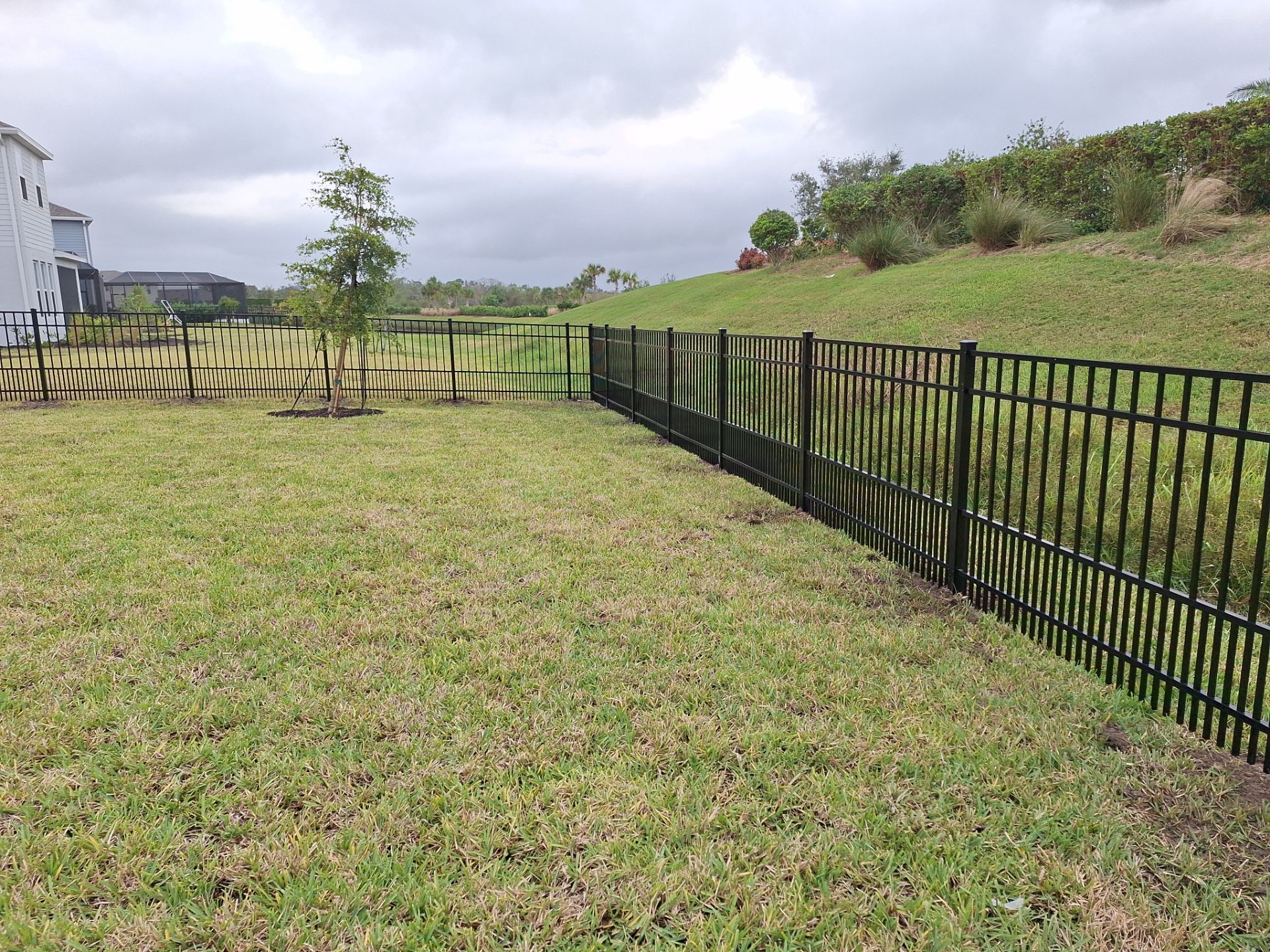 Aluminum Fence Installation using 4ft 3 Rail Black Aluminum Fence by Asap fence and gates, LLC