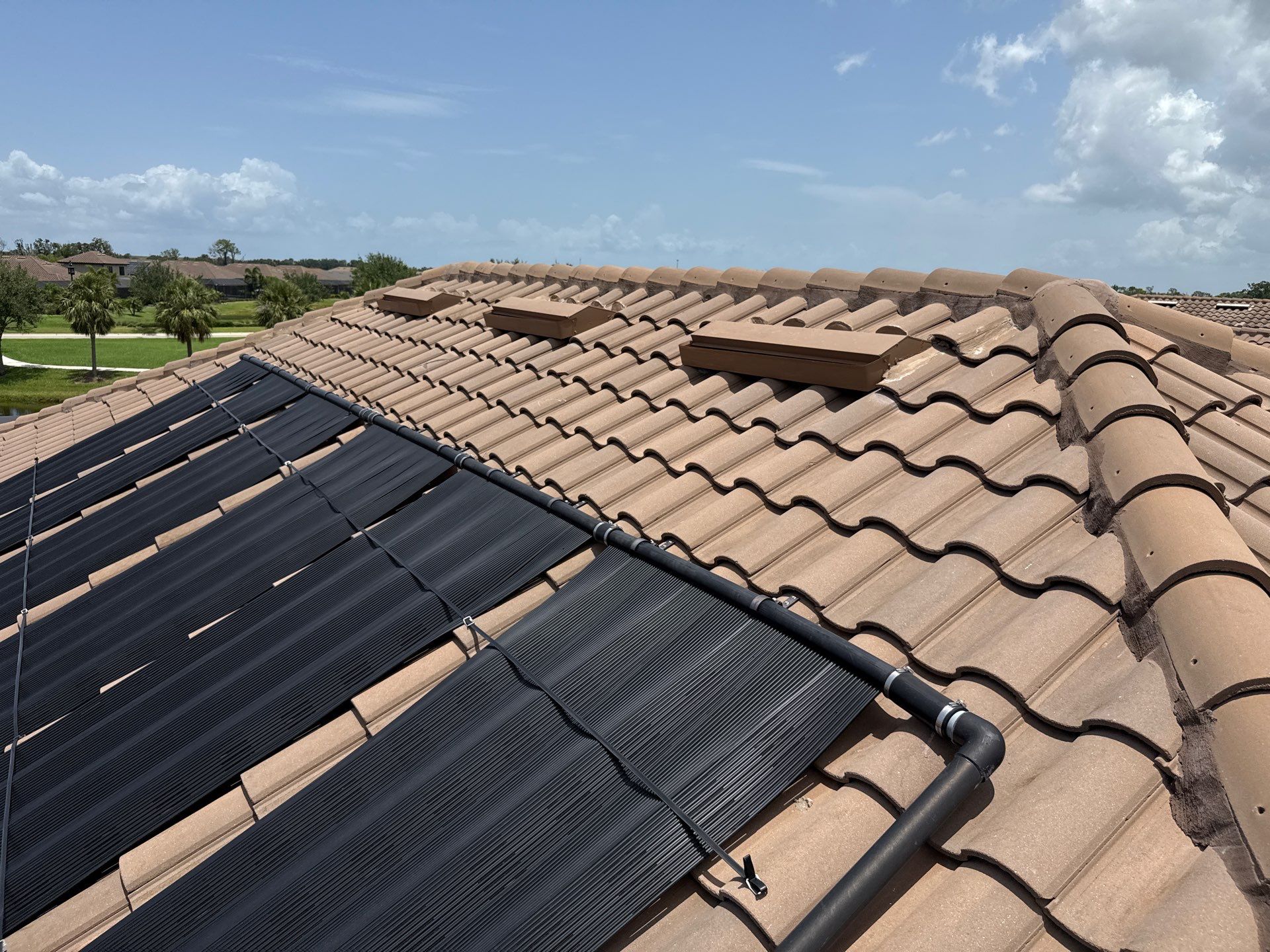 Neighboring Tile Roof Cleaning with Gutter Runoff Control – Palmetto, FL by Sunshine AquaWash
