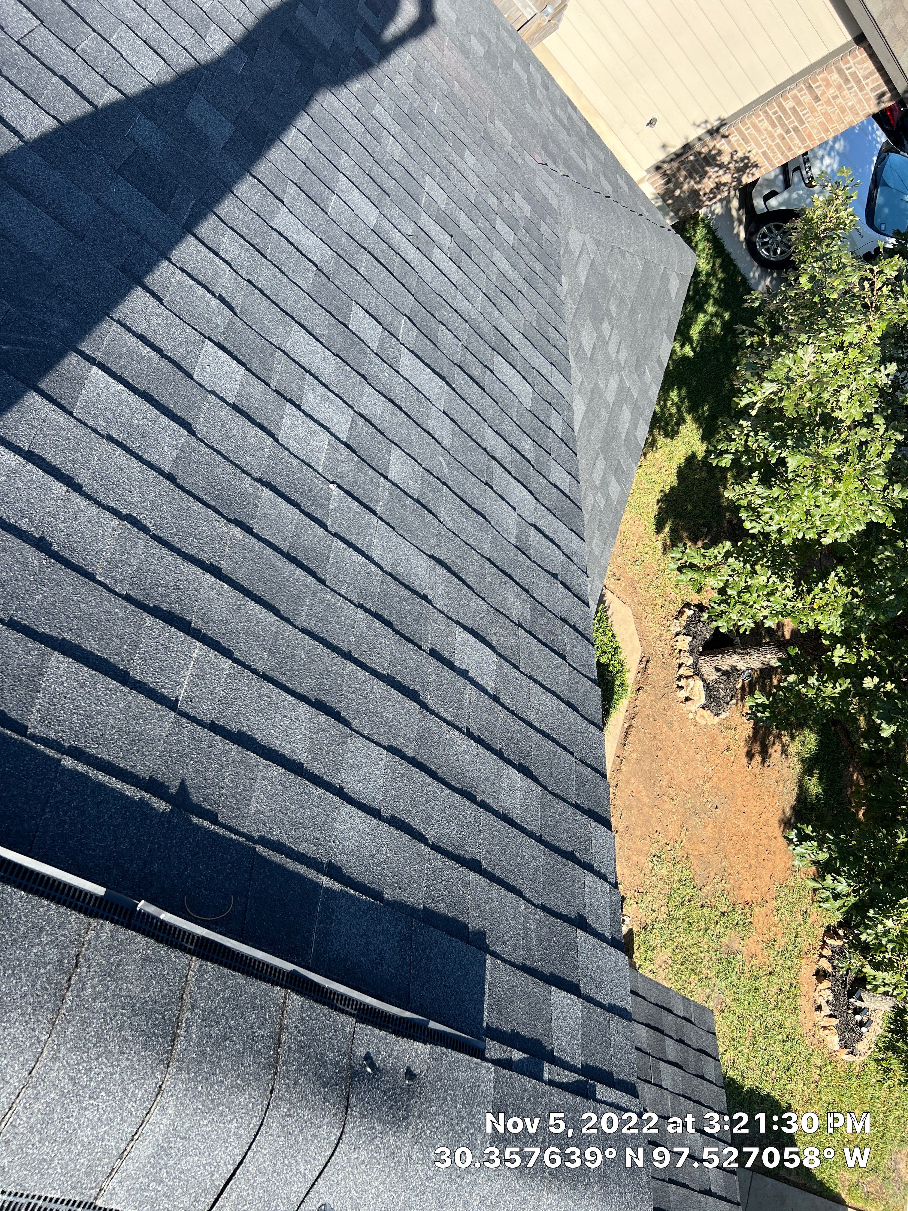 Asphalt Shingle Roof Replacement and Window Glazing in Manor by Caliber Restoration LLC