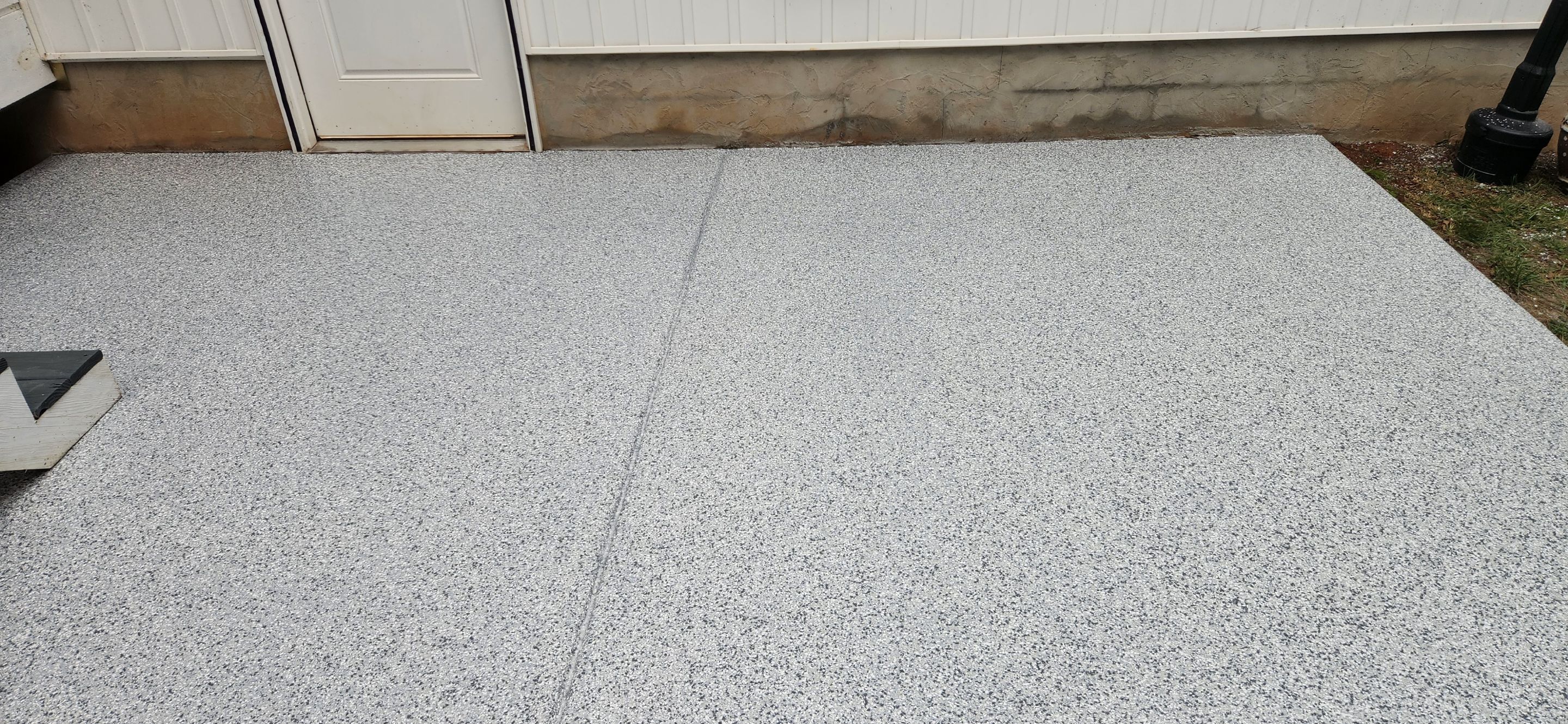 Back Patio using Gravel by Elite Floor Solutions
