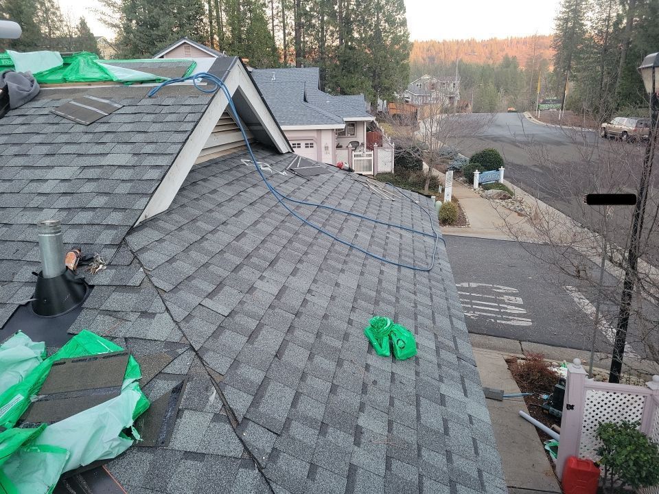 Attic Insulation, Roofing, and Solar for this in-town home by Byers Enterprises 