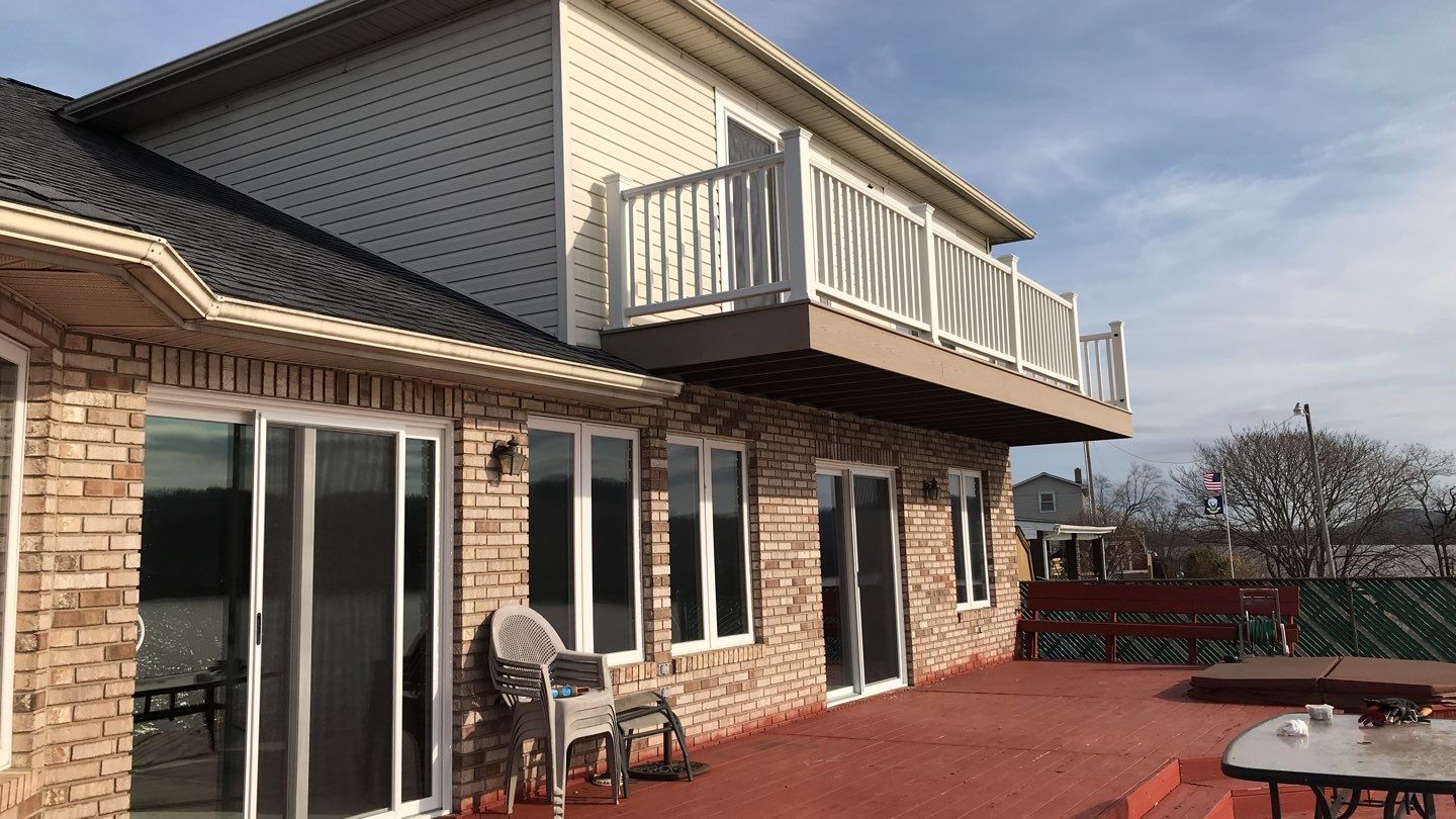 Deck Refurbush and Door Replacement using Trex Decking and Railing. Polaris Patio Doors by Secure Construction Company Inc