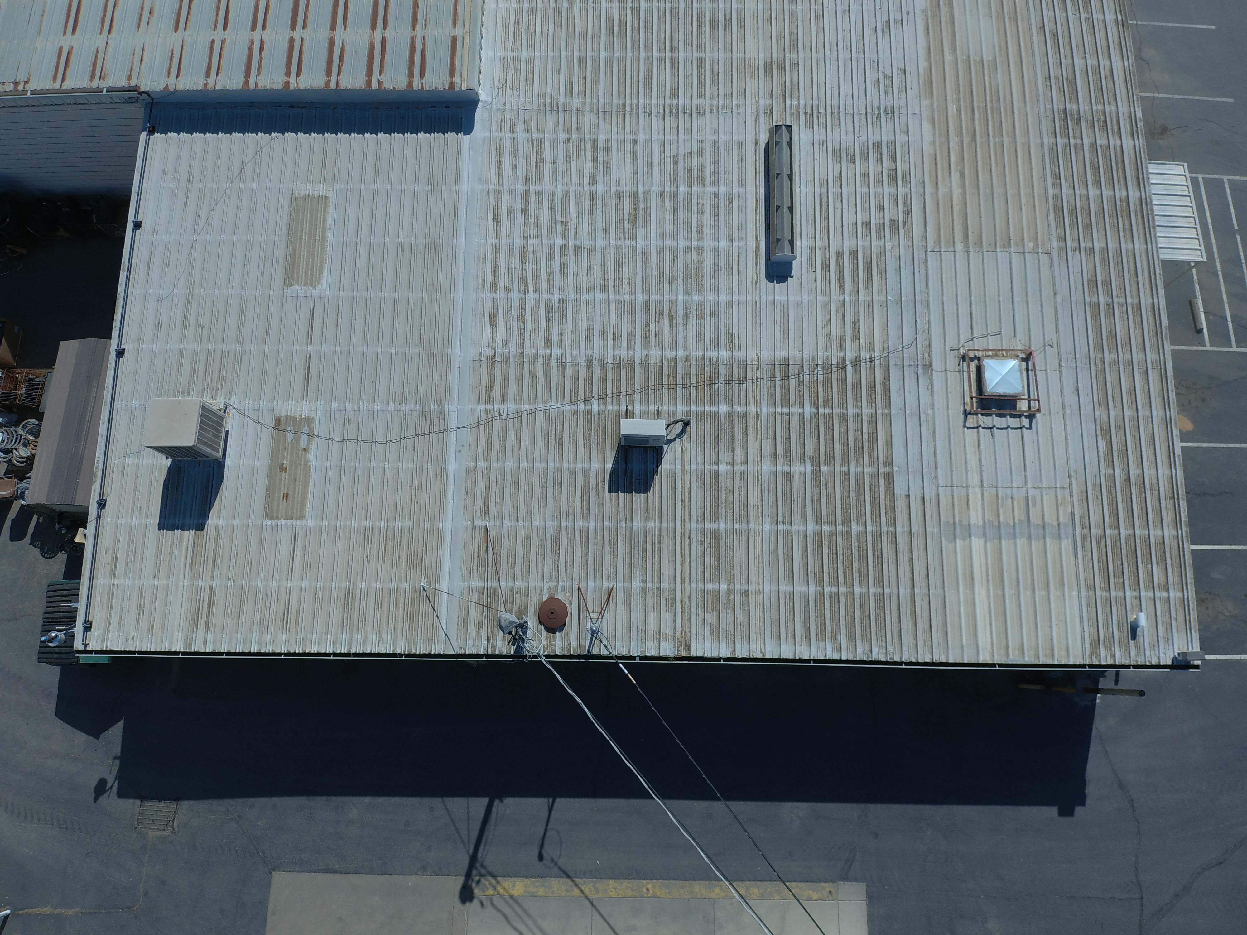 Spray foam and coatings using Conklin Benchmark/PUMA XL coatings and spray foam by Straight Edge Roofing Inc