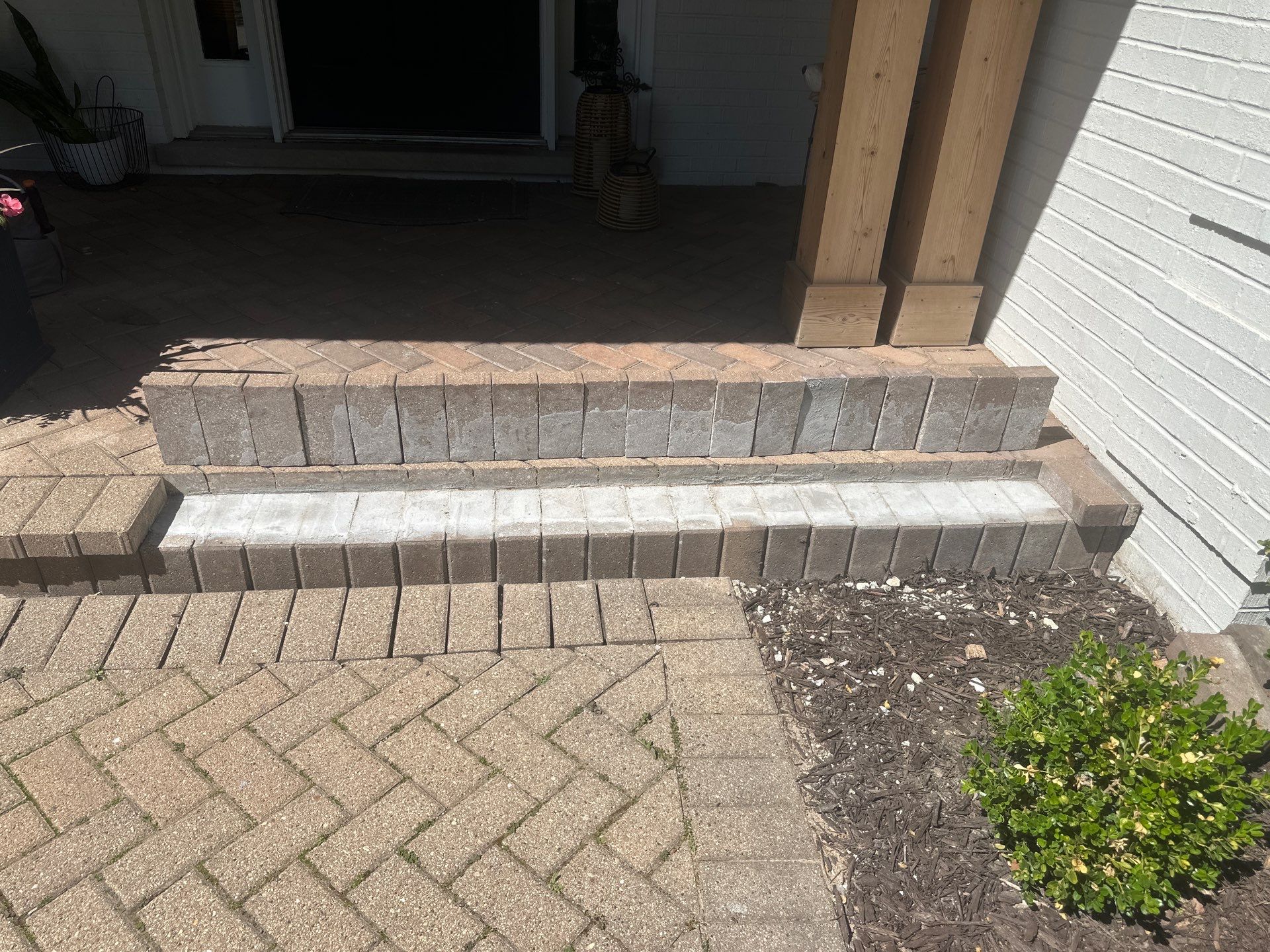 Brick paver repair, cleaning and sealing by Northern Power Washing LLC.