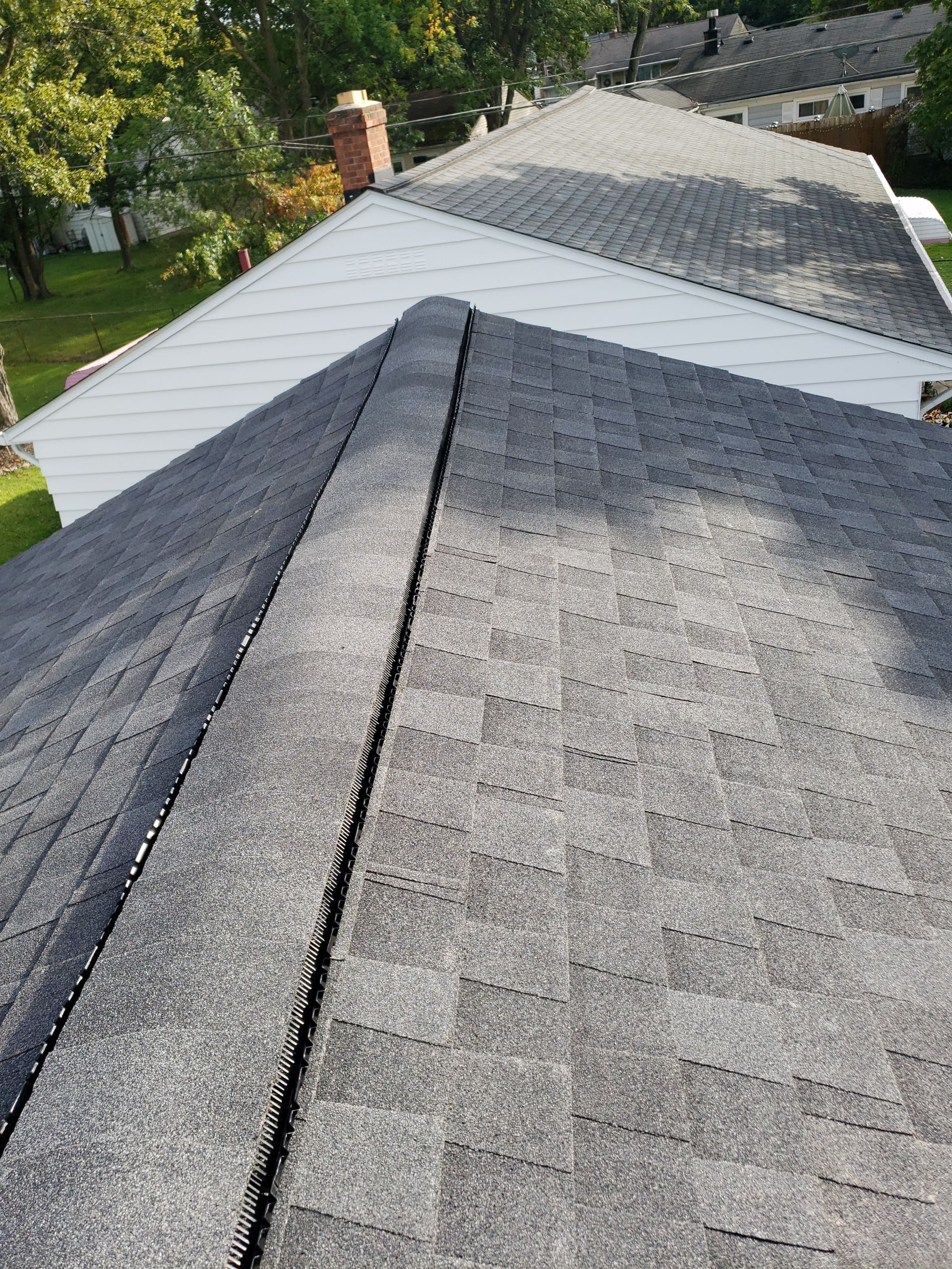 ATLAS PINNACLE COLOR: PRISTINE BLACK SHADOW DRIP EDGE: WHITE by Eagle Eye Roofing