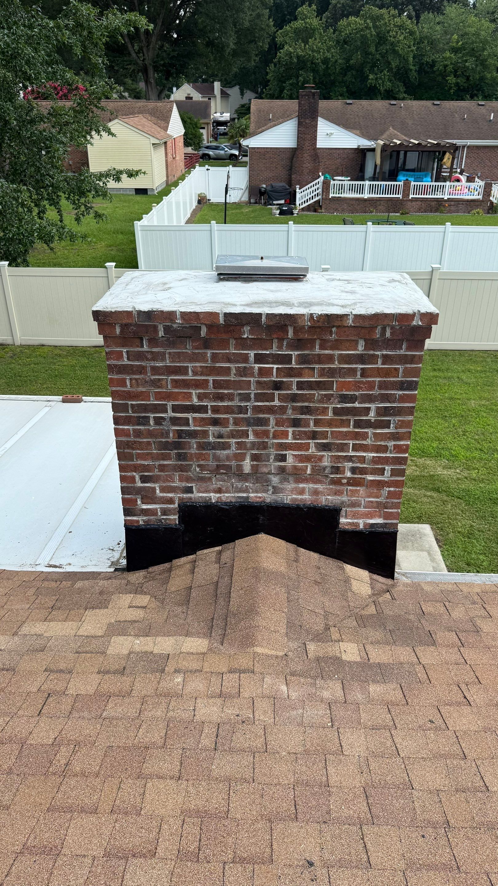 Chimney Relining, Masonry Repair, and Flashing Replacement in Chesapeake, VA by Premier Chimney and Roofing